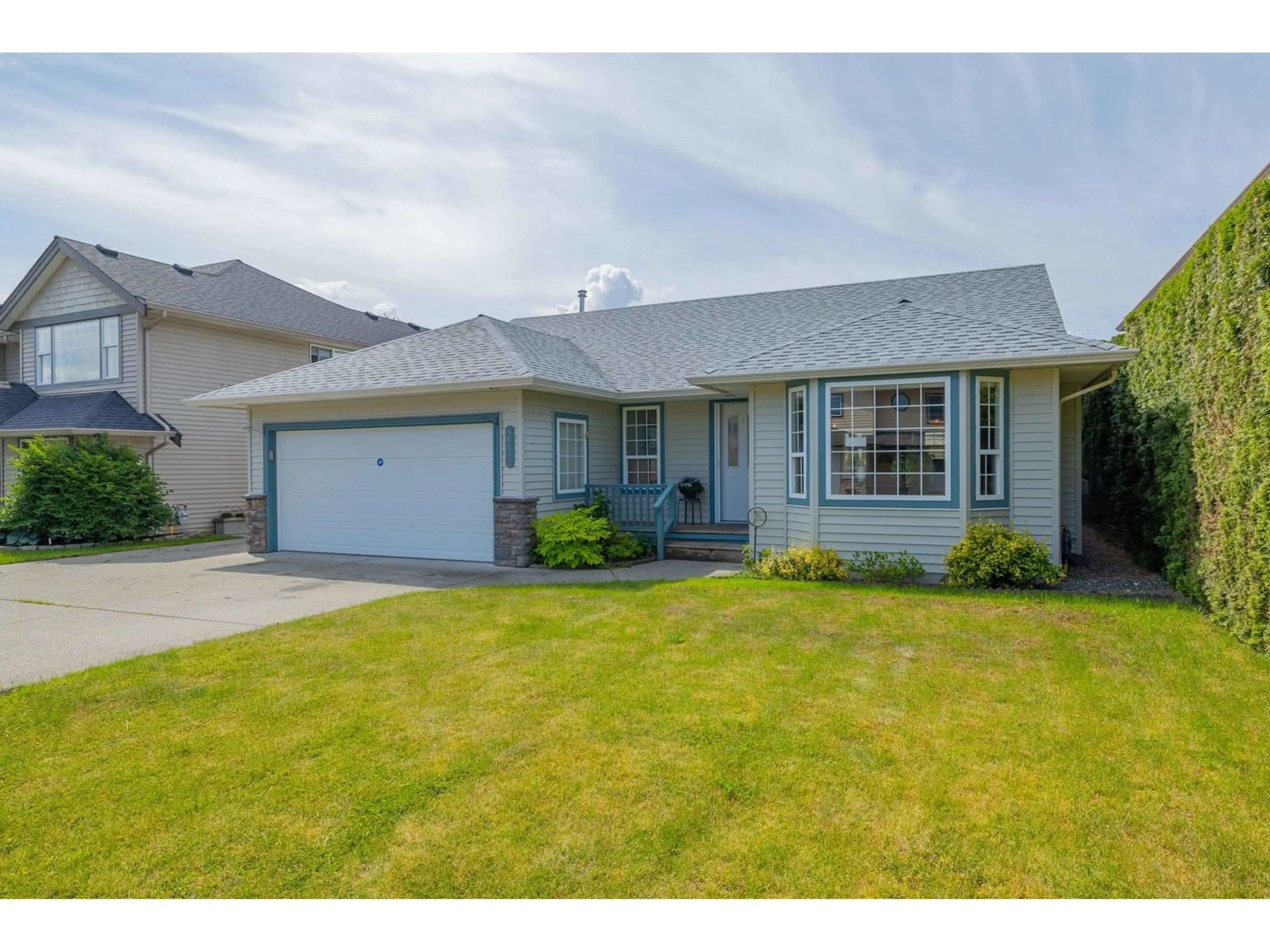 Home with vinyl exterior material, street for 46492 RANCHERO DRIVE, Chilliwack British Columbia V4Z1K3