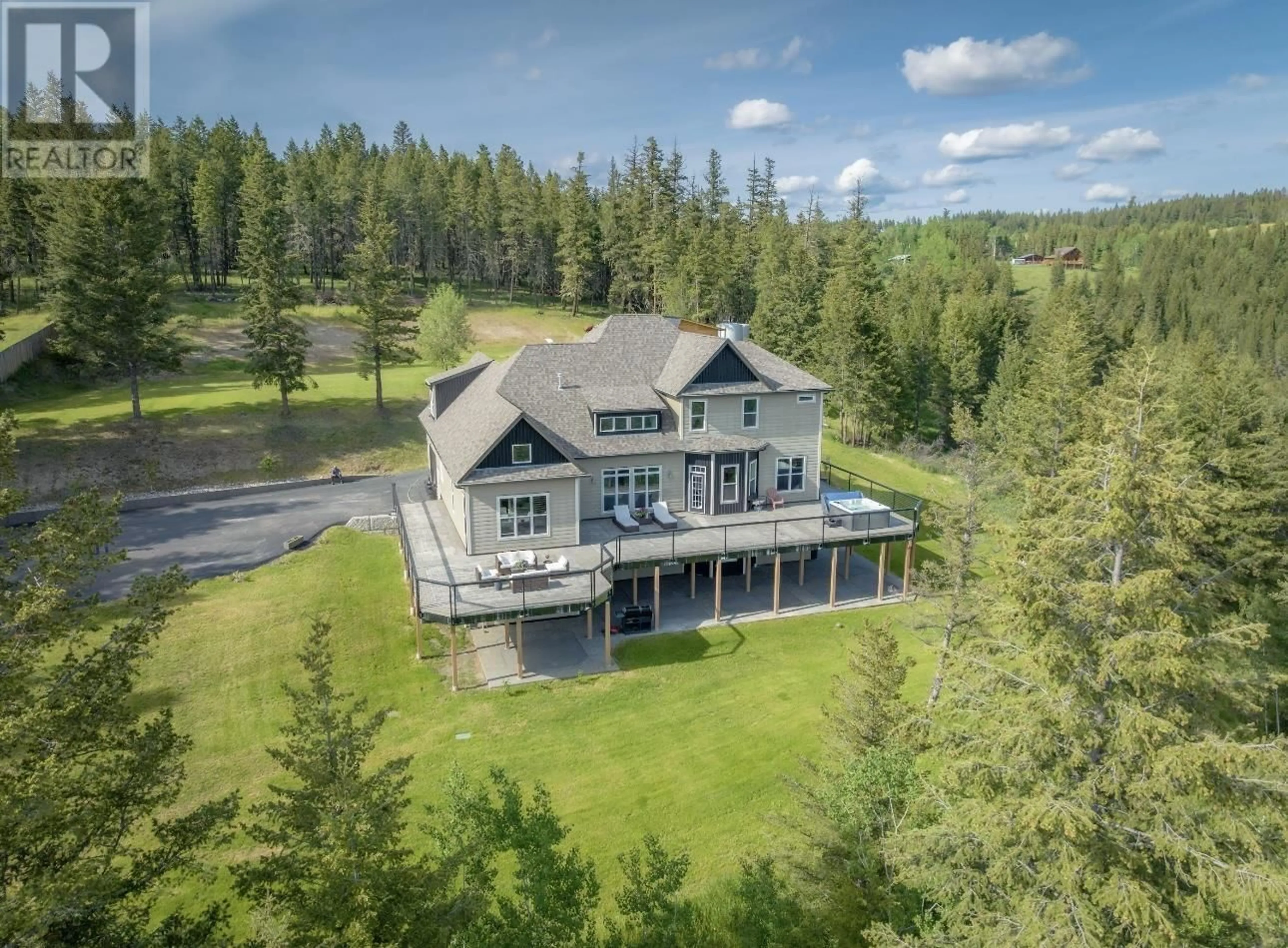 A pic from outside/outdoor area/front of a property/back of a property/a pic from drone, water/lake/river/ocean view for 1731 MACGREGOR DRIVE, Williams Lake British Columbia V2G4W1