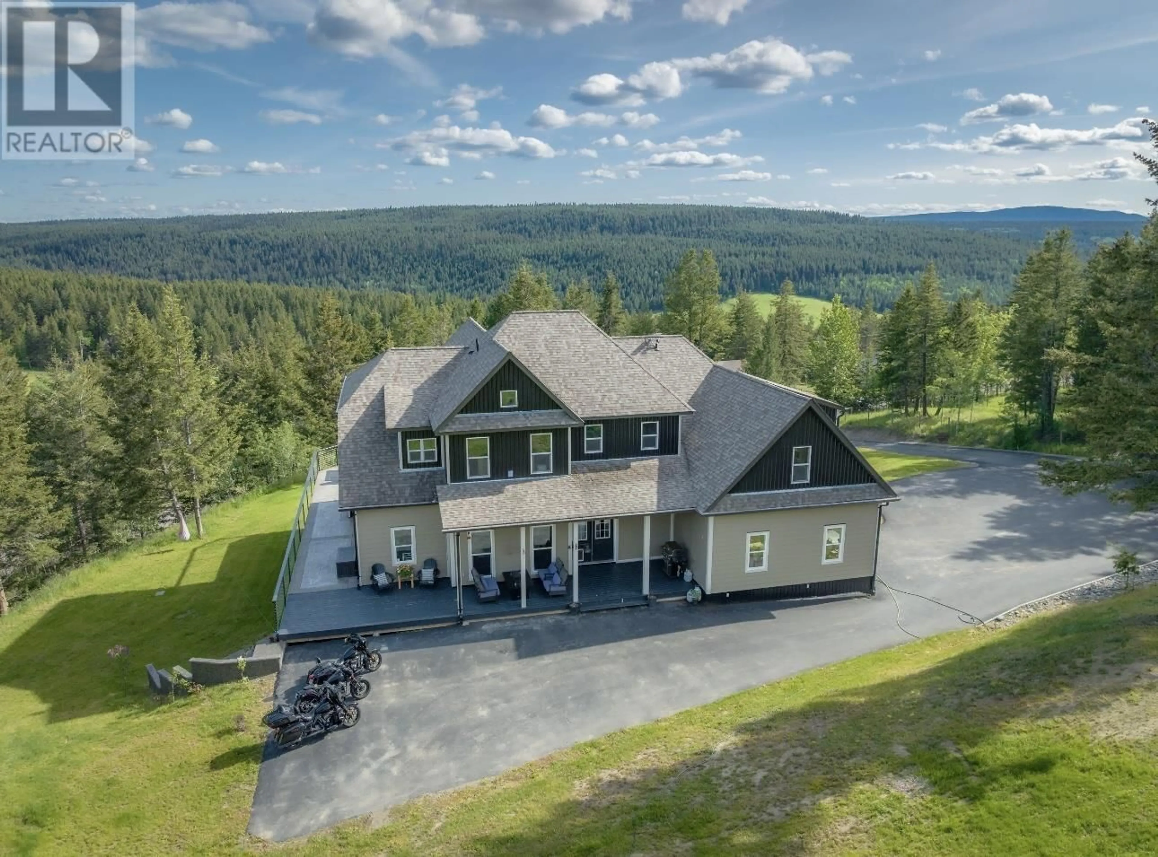 A pic from outside/outdoor area/front of a property/back of a property/a pic from drone, mountain view for 1731 MACGREGOR DRIVE, Williams Lake British Columbia V2G4W1