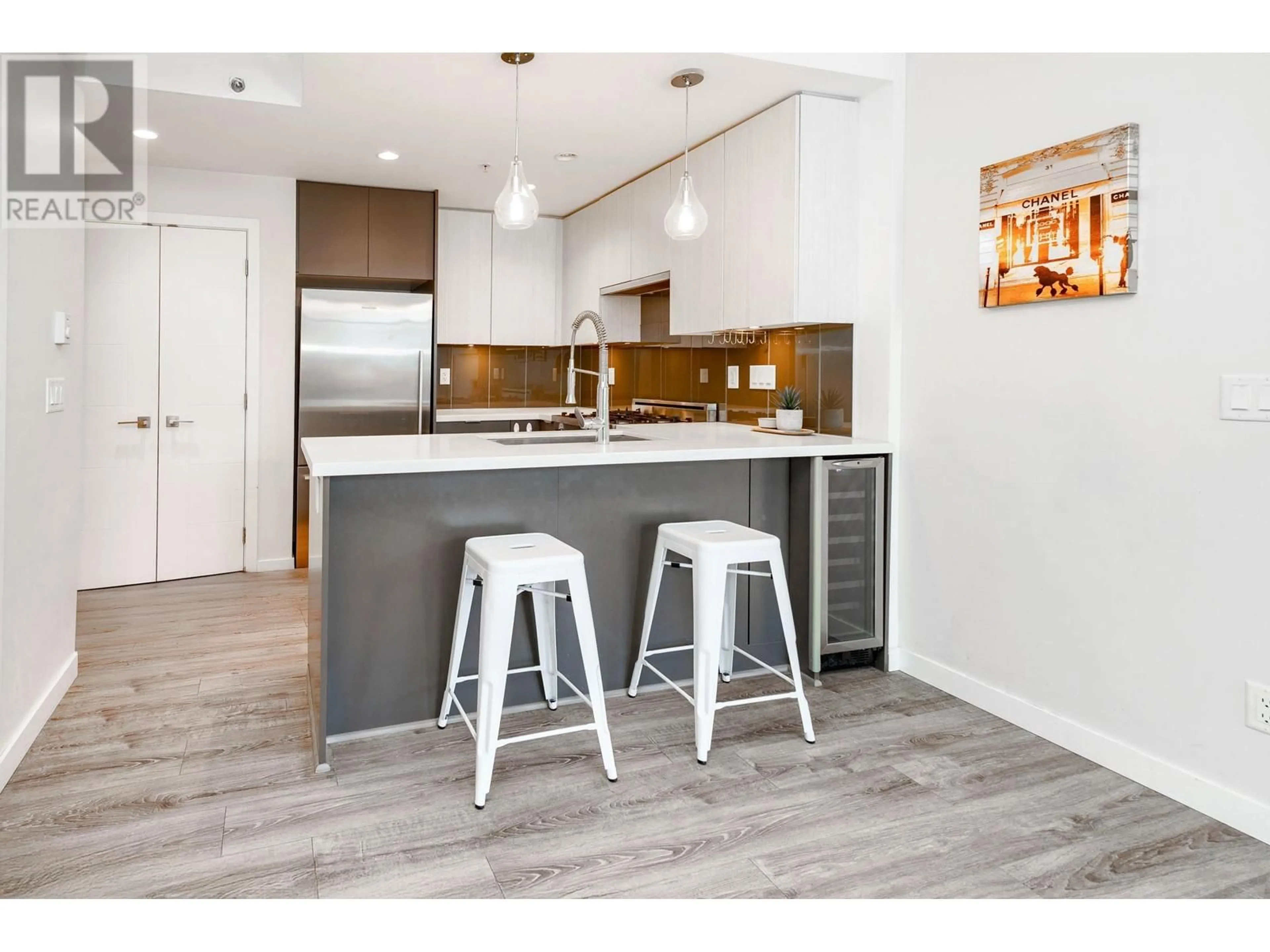 Open concept kitchen, wood/laminate floor for 205 - 711 BRESLAY STREET, Coquitlam British Columbia V3J0G7