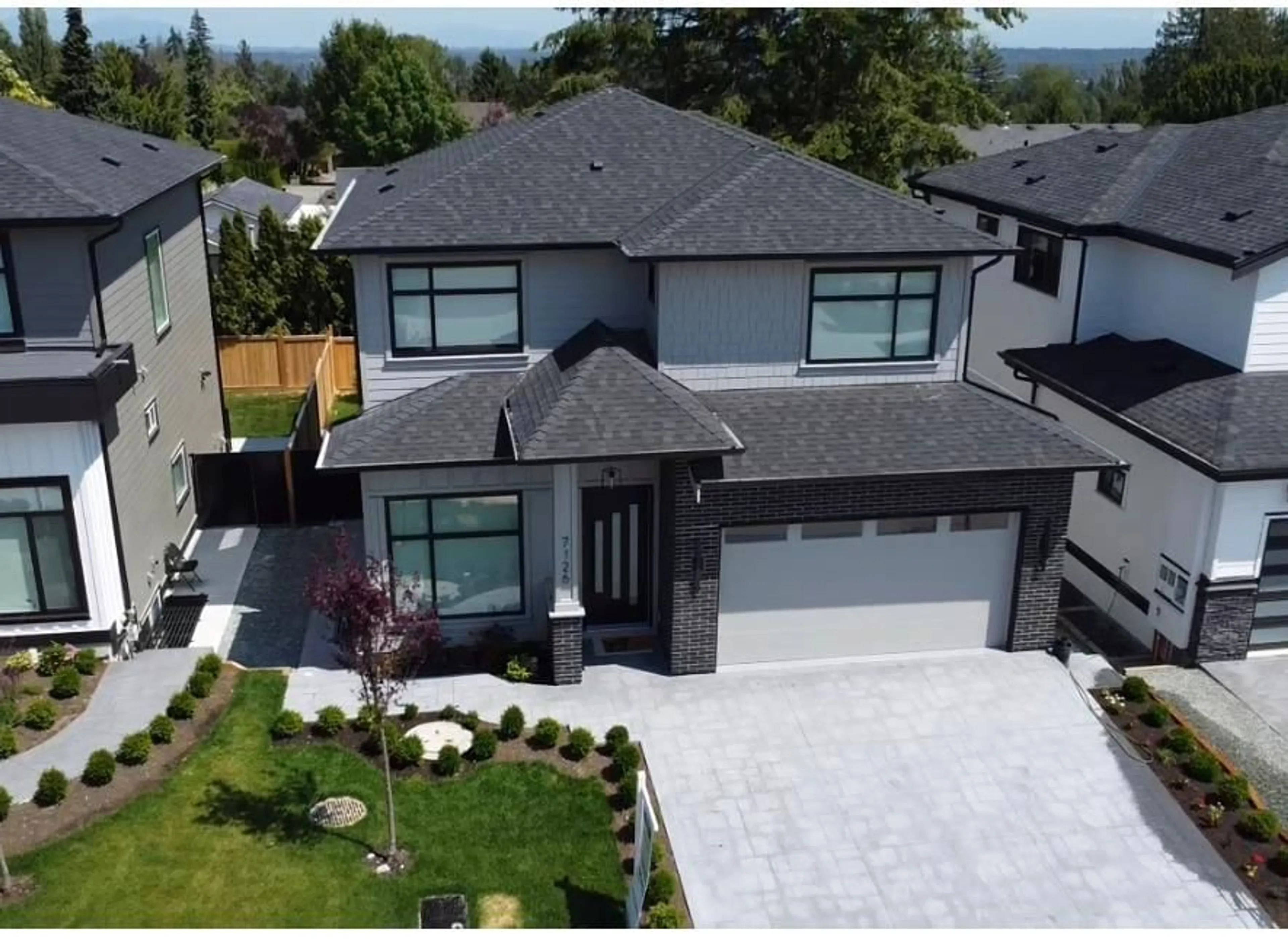 A pic from outside/outdoor area/front of a property/back of a property/a pic from drone, mountain view for 7126 204A, Langley British Columbia V2Y3S7