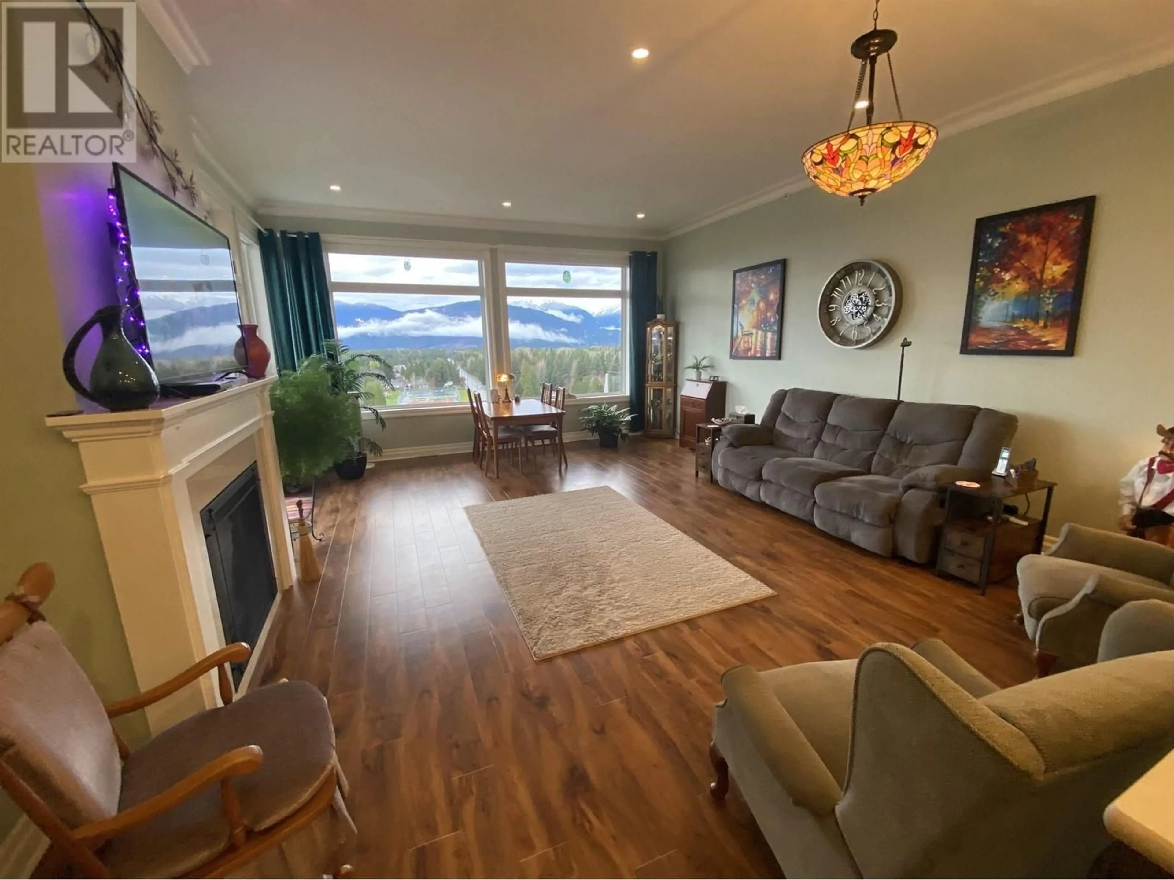 Living room with furniture, wood/laminate floor for 18 - 4022 YEO STREET, Terrace British Columbia V8G0H5