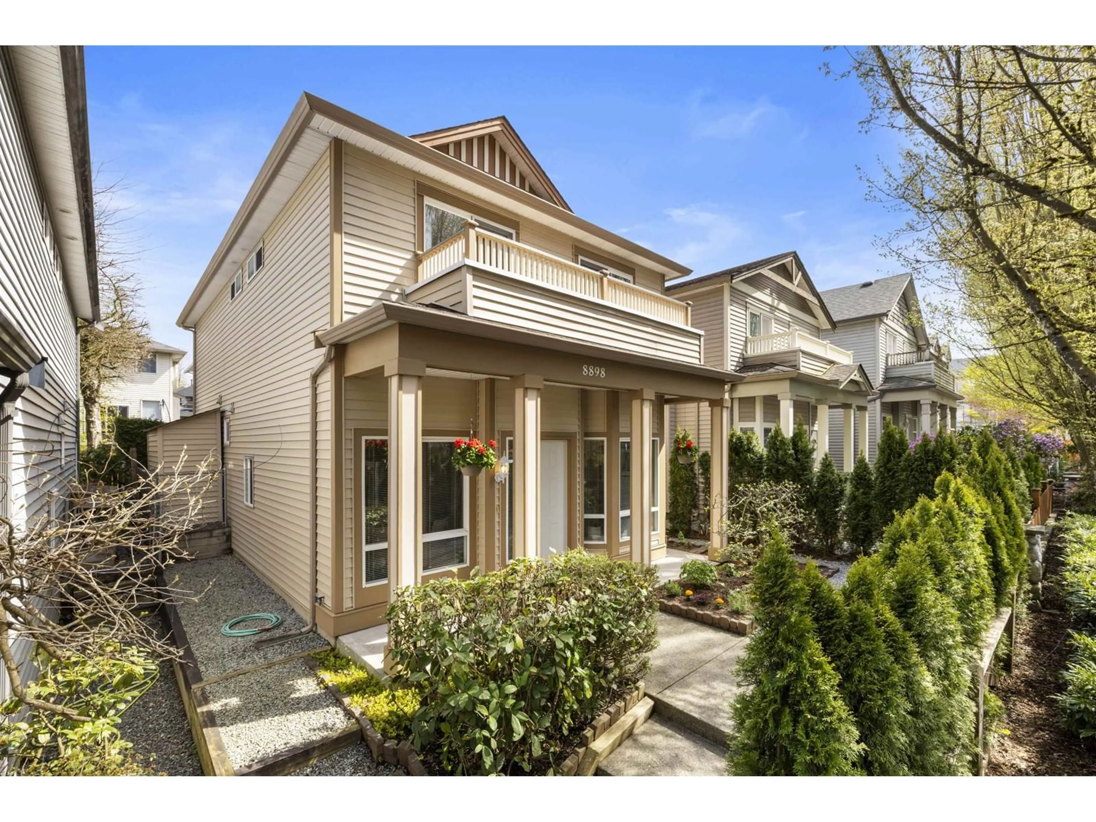 Home with vinyl exterior material, street for 8898 216, Langley British Columbia V1M3Z7