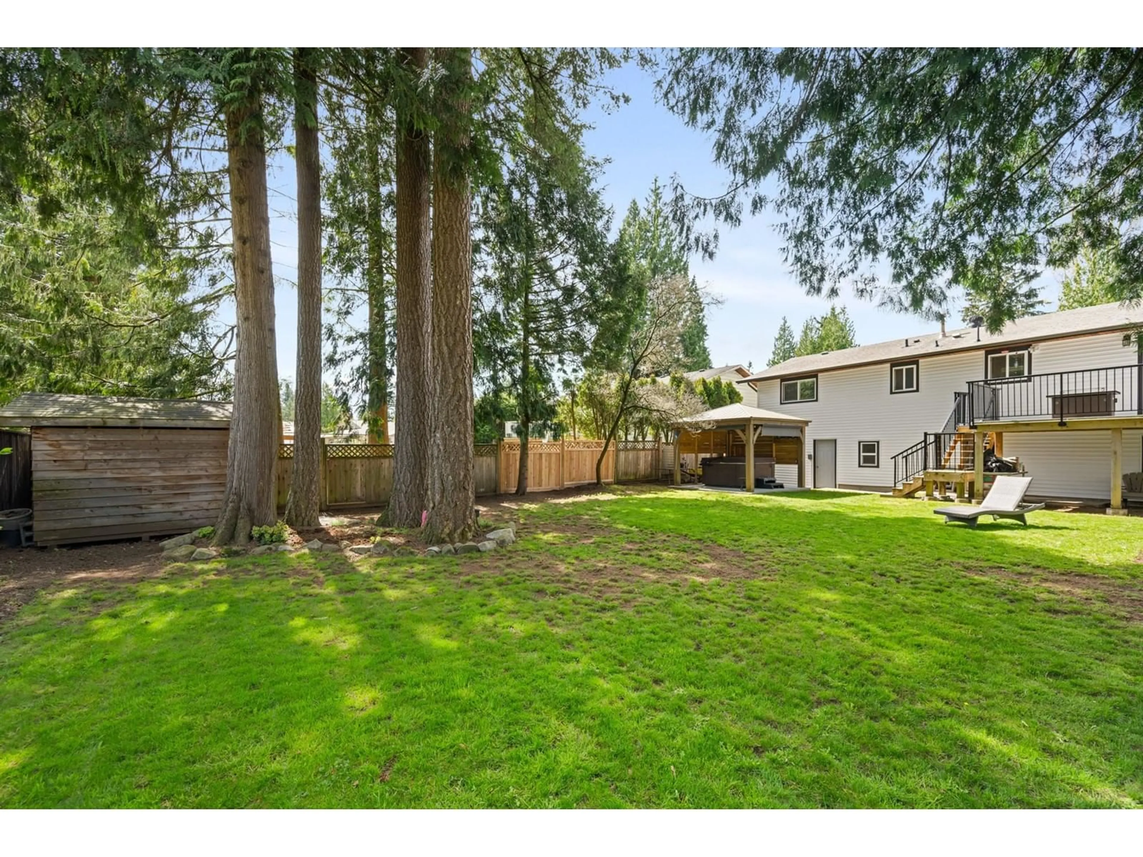A pic from outside/outdoor area/front of a property/back of a property/a pic from drone, forest/trees view for 4506 201, Langley British Columbia V3A6K1