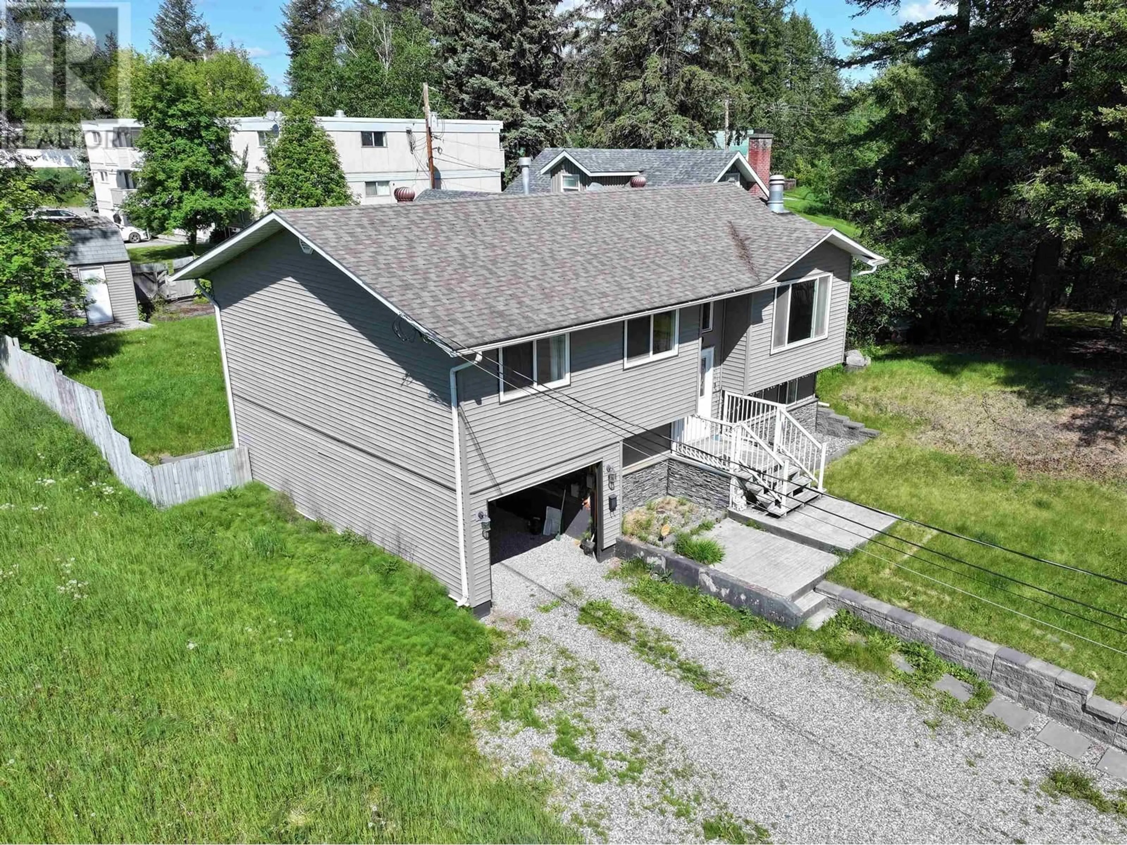 A pic from outside/outdoor area/front of a property/back of a property/a pic from drone, street for 679 JONES STREET, Quesnel British Columbia V2J2X3