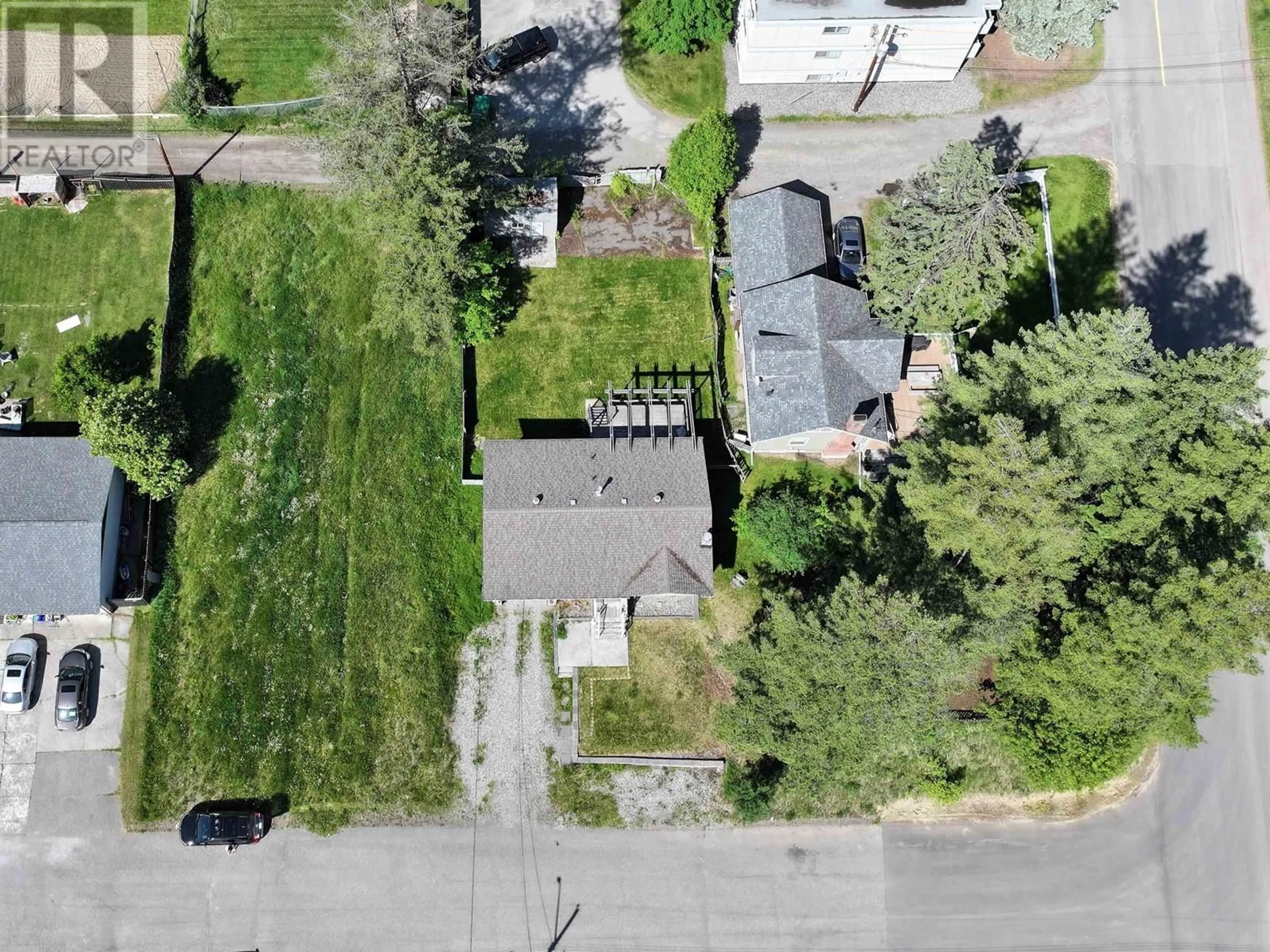 A pic from outside/outdoor area/front of a property/back of a property/a pic from drone, street for 679 JONES STREET, Quesnel British Columbia V2J2X3