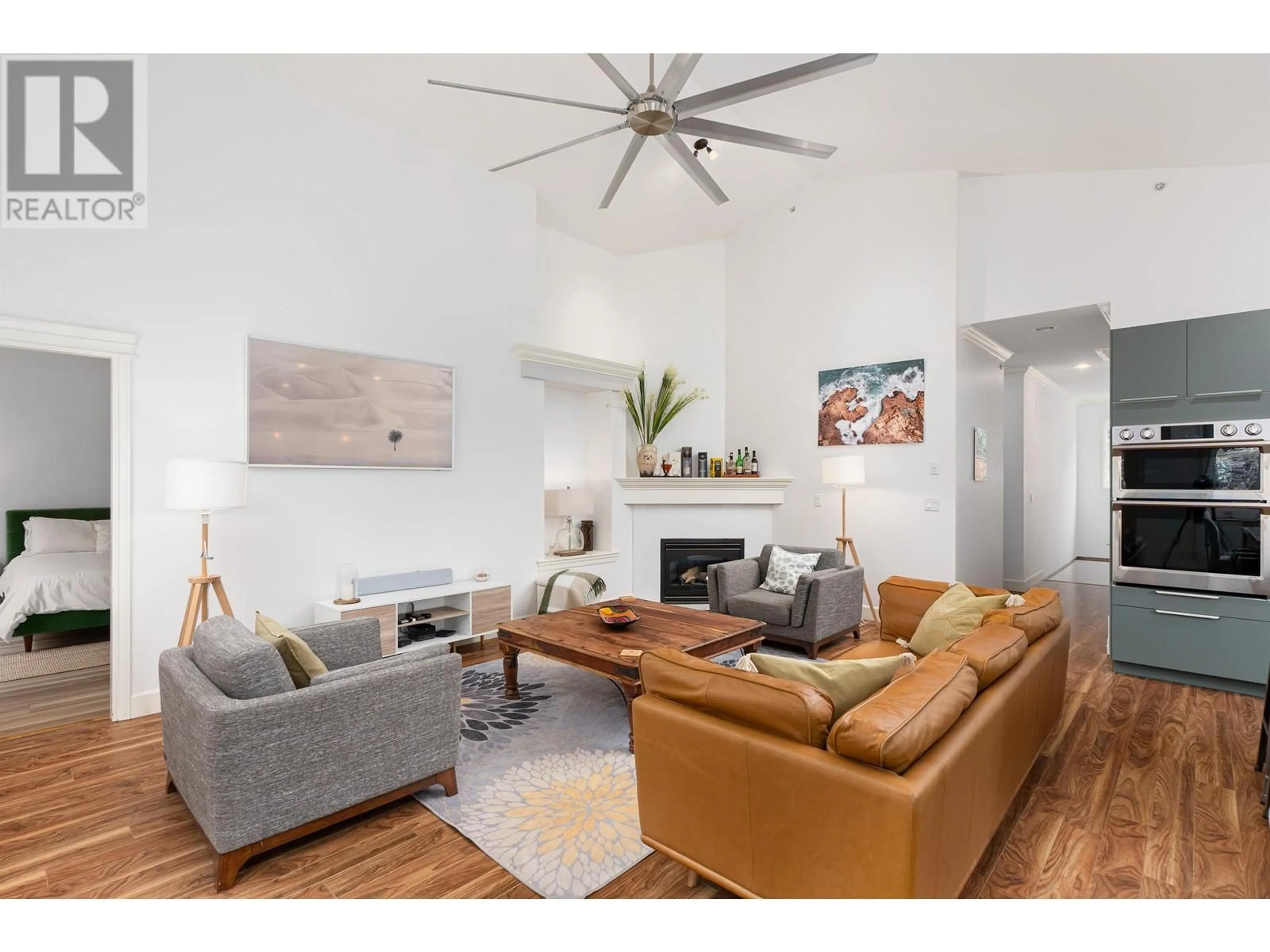 Living room with furniture, wood/laminate floor for 13451 240 STREET, Maple Ridge British Columbia V4R0A4