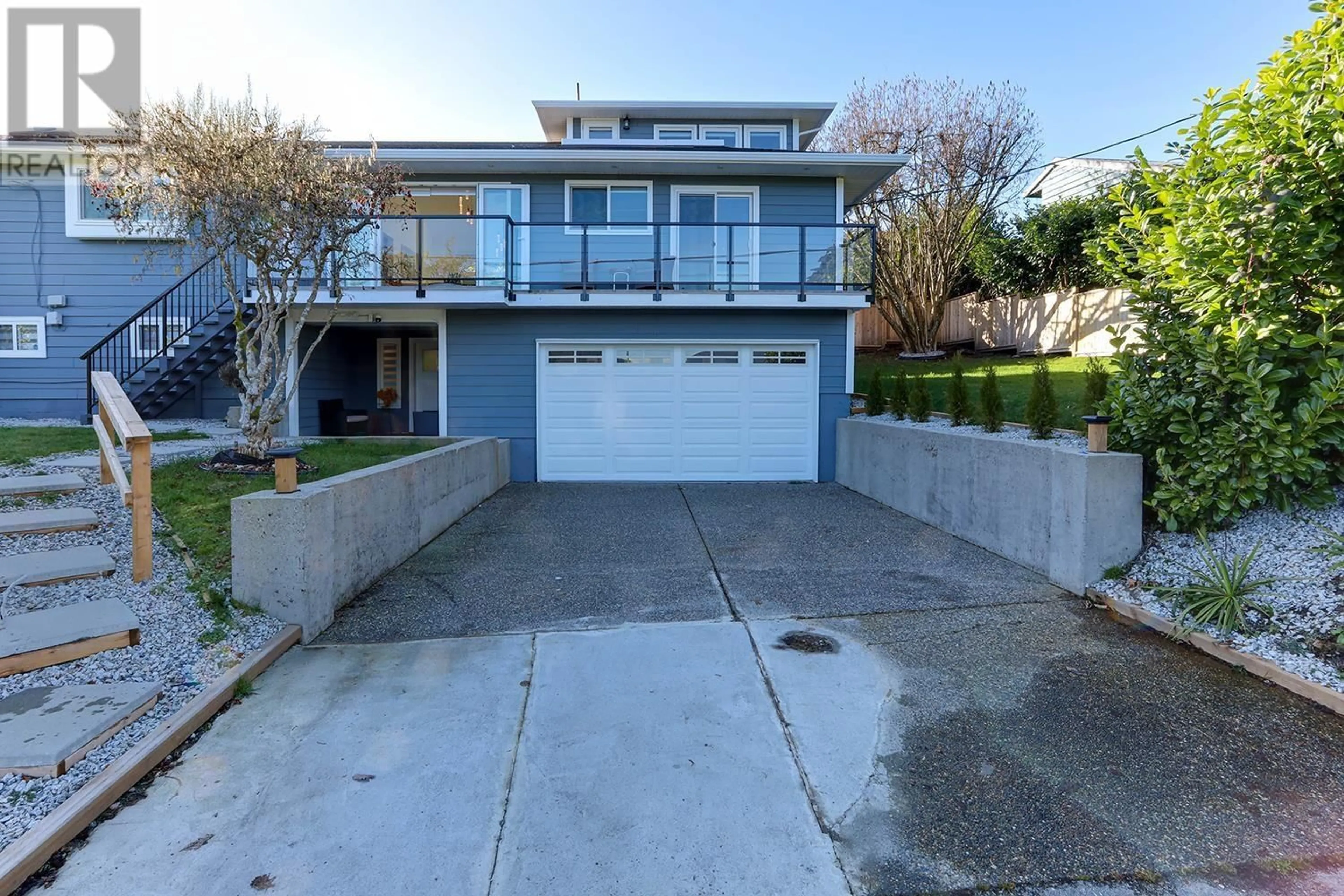 A pic from outside/outdoor area/front of a property/back of a property/a pic from drone, street for 4254 CADDY ROAD, North Vancouver British Columbia V7G1B7