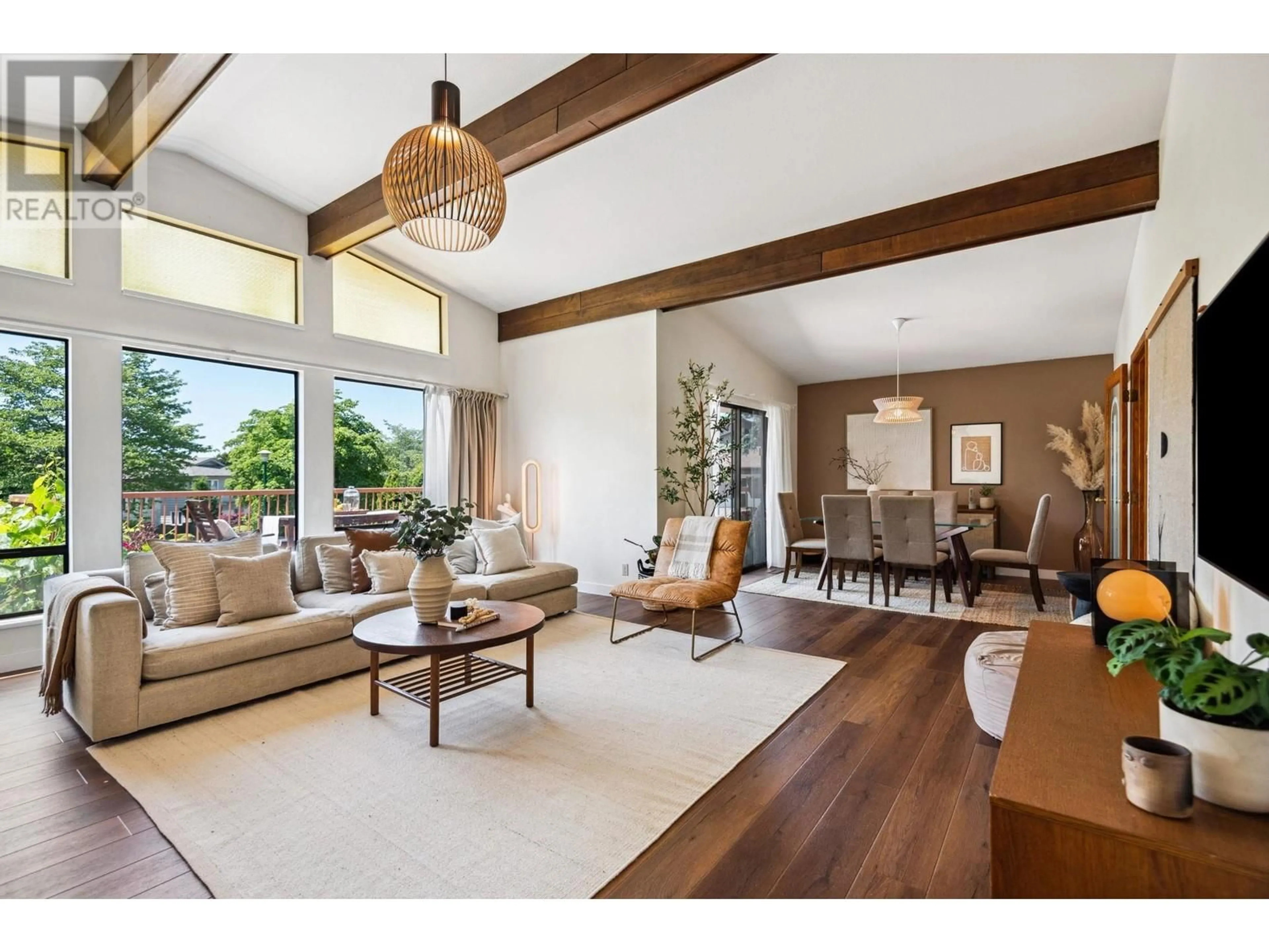 Living room with furniture, wood/laminate floor for 7766 MUNROE CRESCENT, Vancouver British Columbia V5S3J9