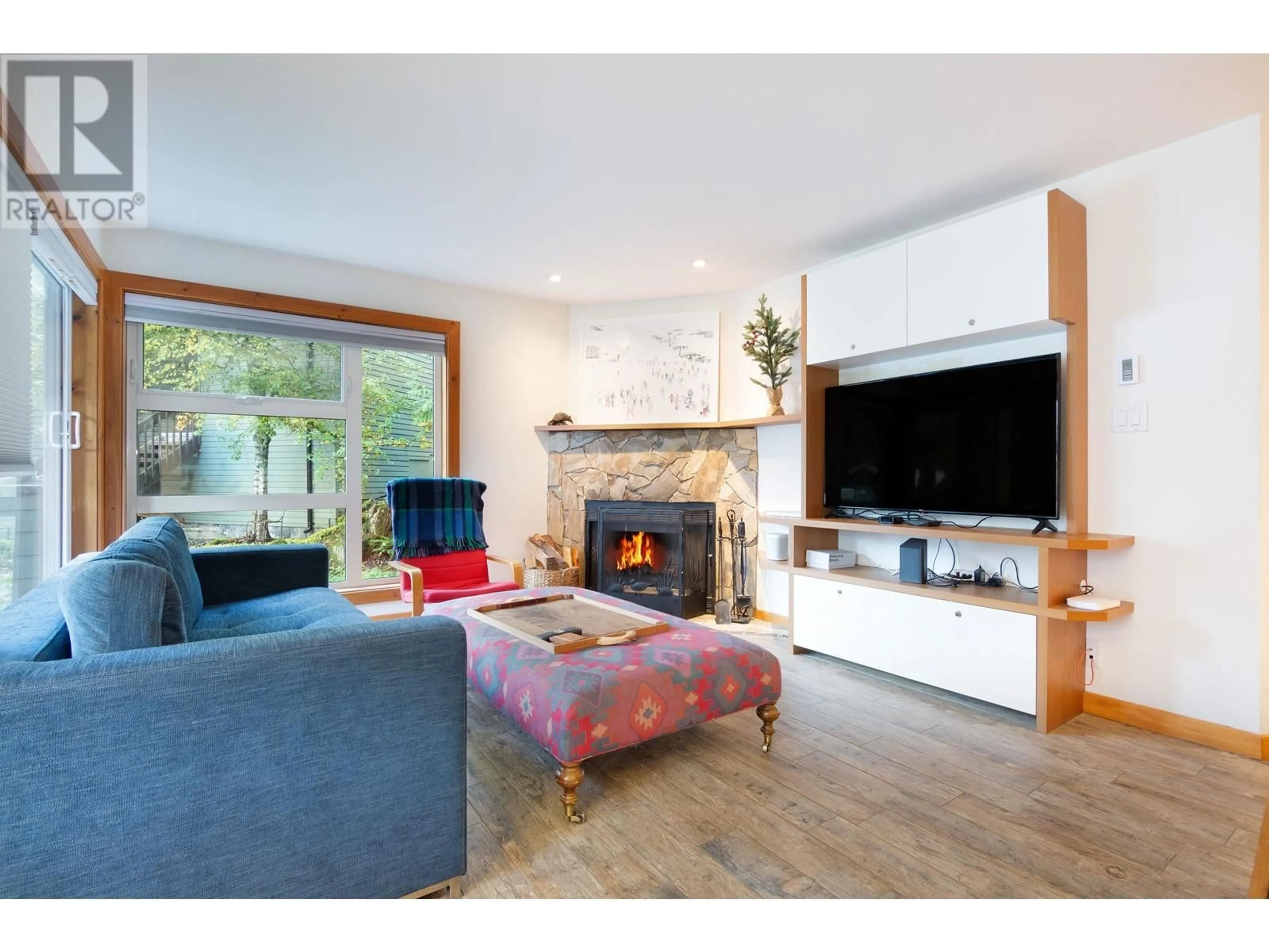 Living room with furniture, wood/laminate floor for 9 - 2217 MARMOT PLACE, Whistler British Columbia V8E0B4