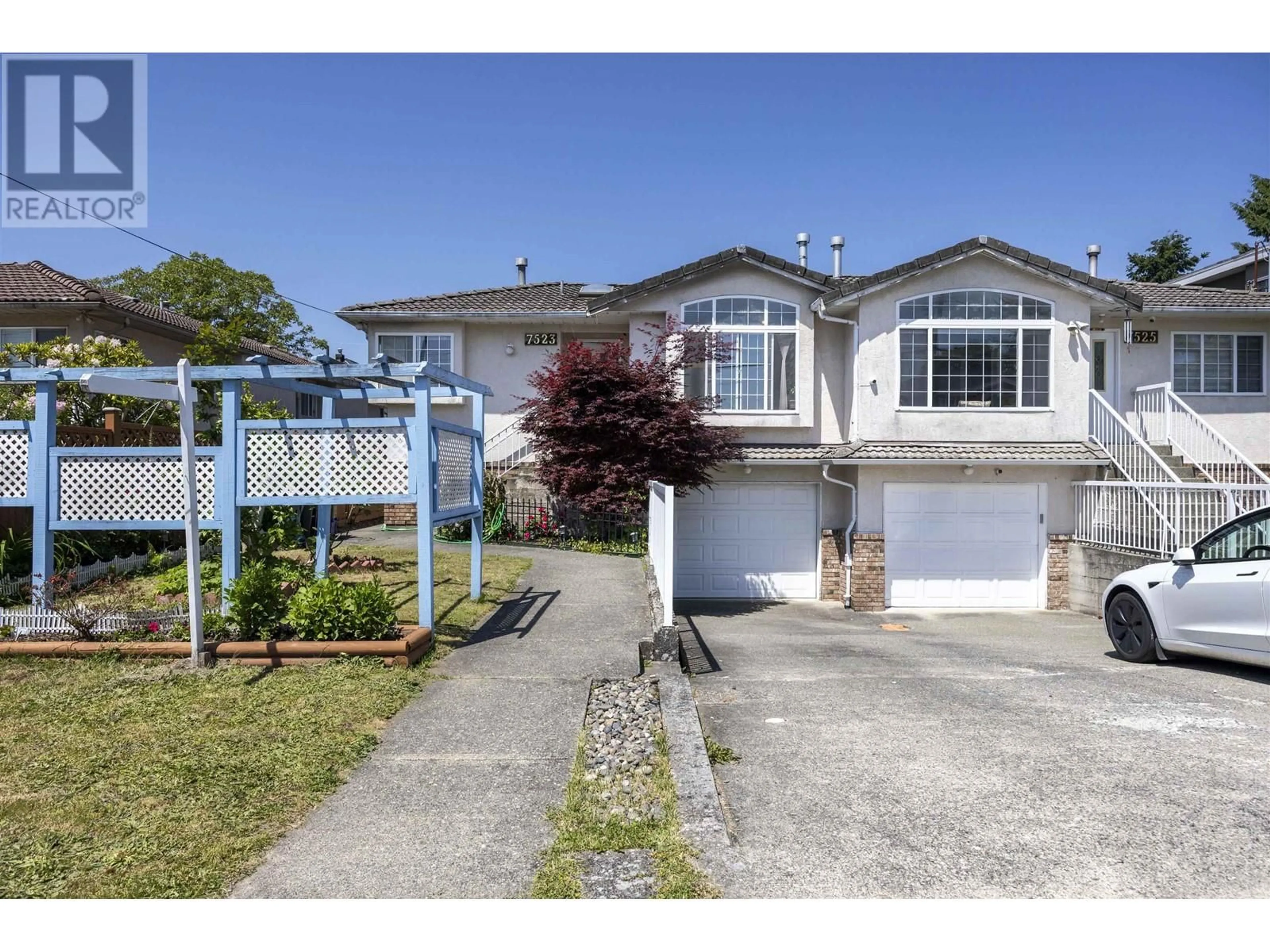 Home with vinyl exterior material, street for 7523 17TH AVENUE, Burnaby British Columbia V3N1L6