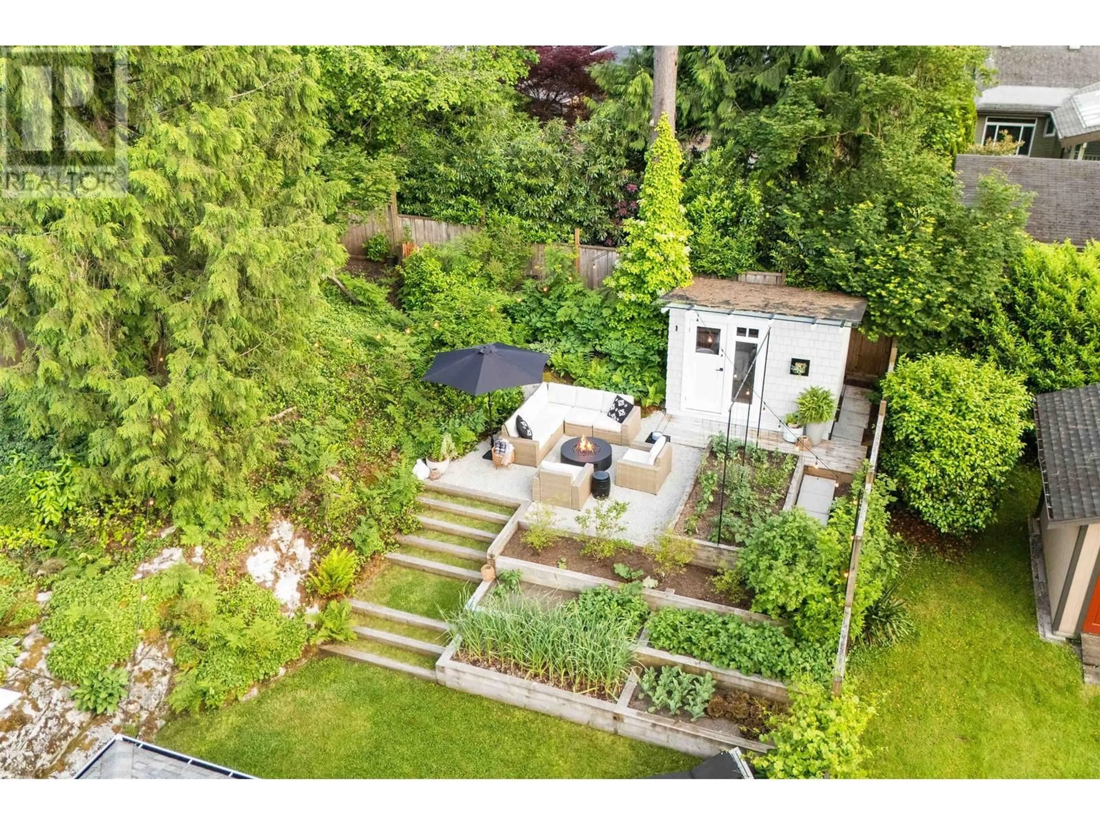 A pic from outside/outdoor area/front of a property/back of a property/a pic from drone, street for 4365 RAEBURN STREET, North Vancouver British Columbia V7G1K1