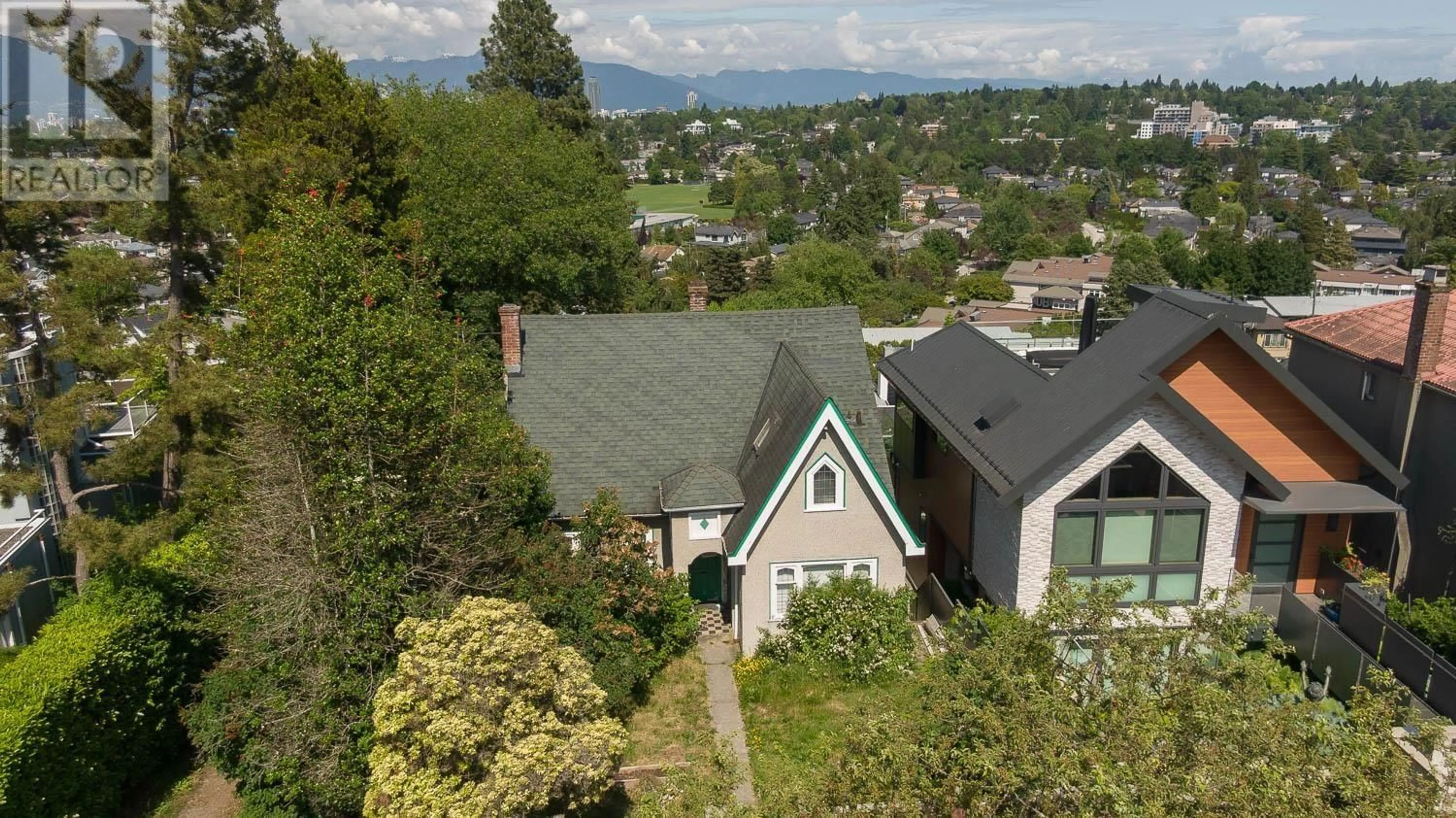 A pic from outside/outdoor area/front of a property/back of a property/a pic from drone, mountain view for 4376 QUESNEL DRIVE, Vancouver British Columbia V6L2X6