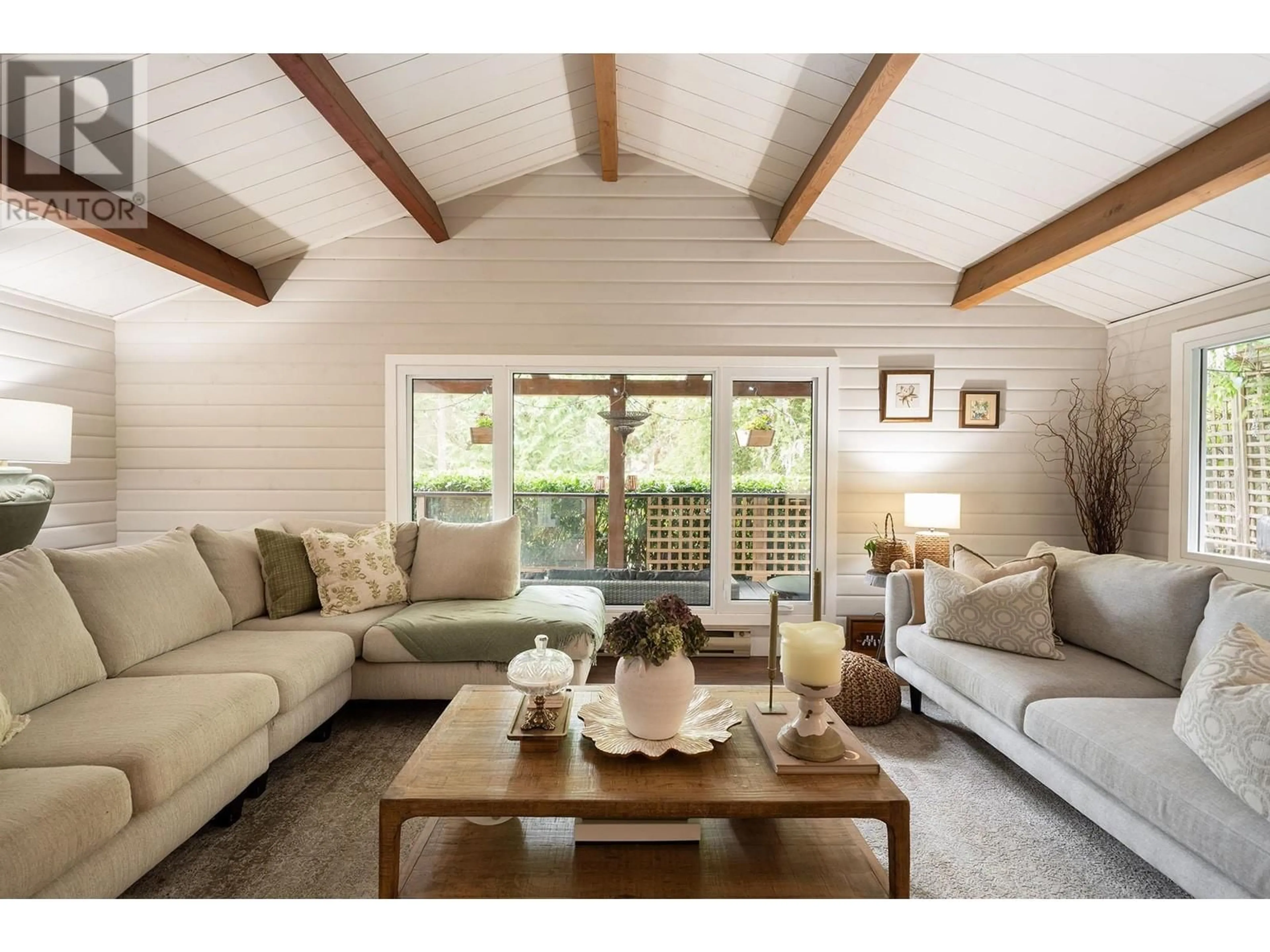 Living room with furniture, wood/laminate floor for 1565 WHITESAILS DRIVE, Bowen Island British Columbia V0N1G2