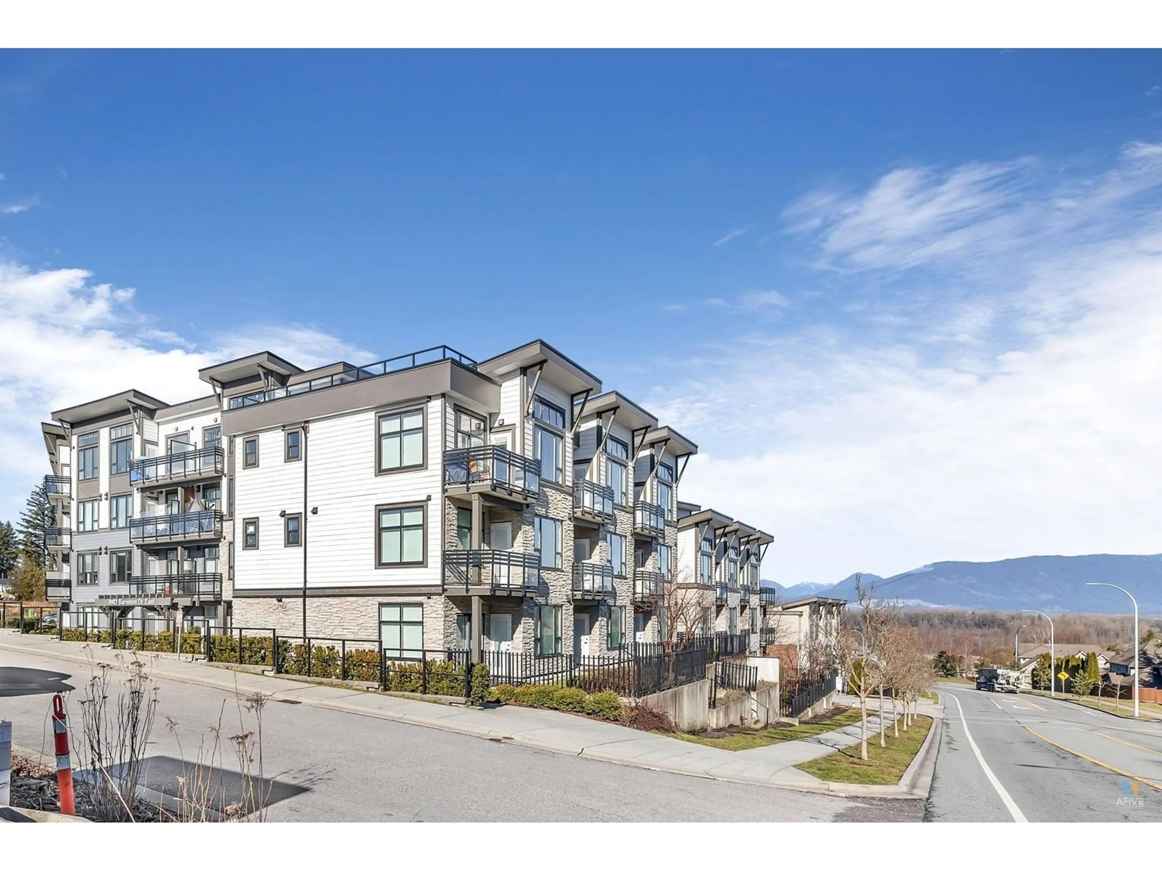 A pic from outside/outdoor area/front of a property/back of a property/a pic from drone, mountain view for 509 - 9983 BARNSTON EAST, Surrey British Columbia V4N6T3
