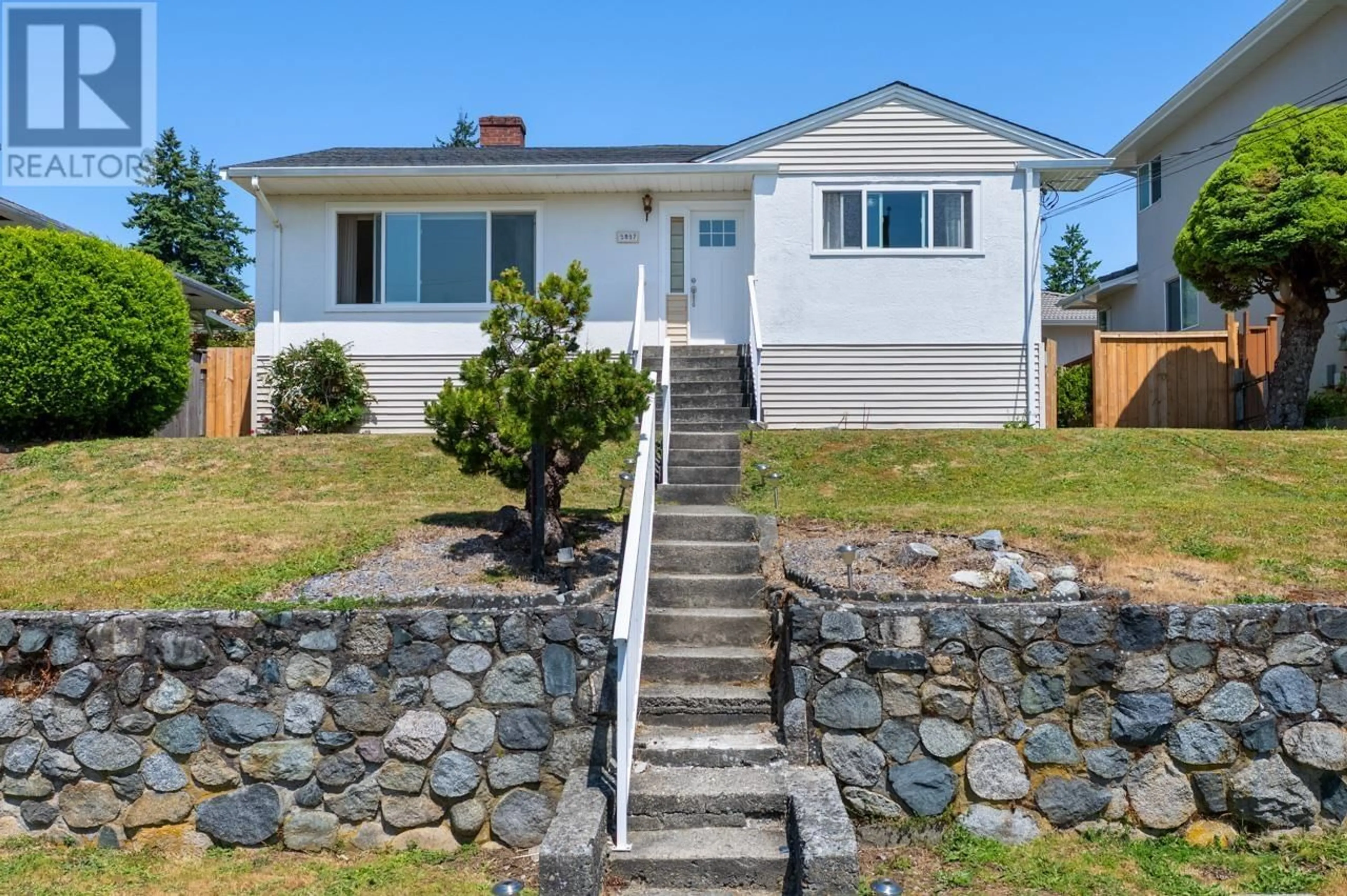 Home with vinyl exterior material, street for 5957 CARSON STREET, Burnaby British Columbia V5J2Z8