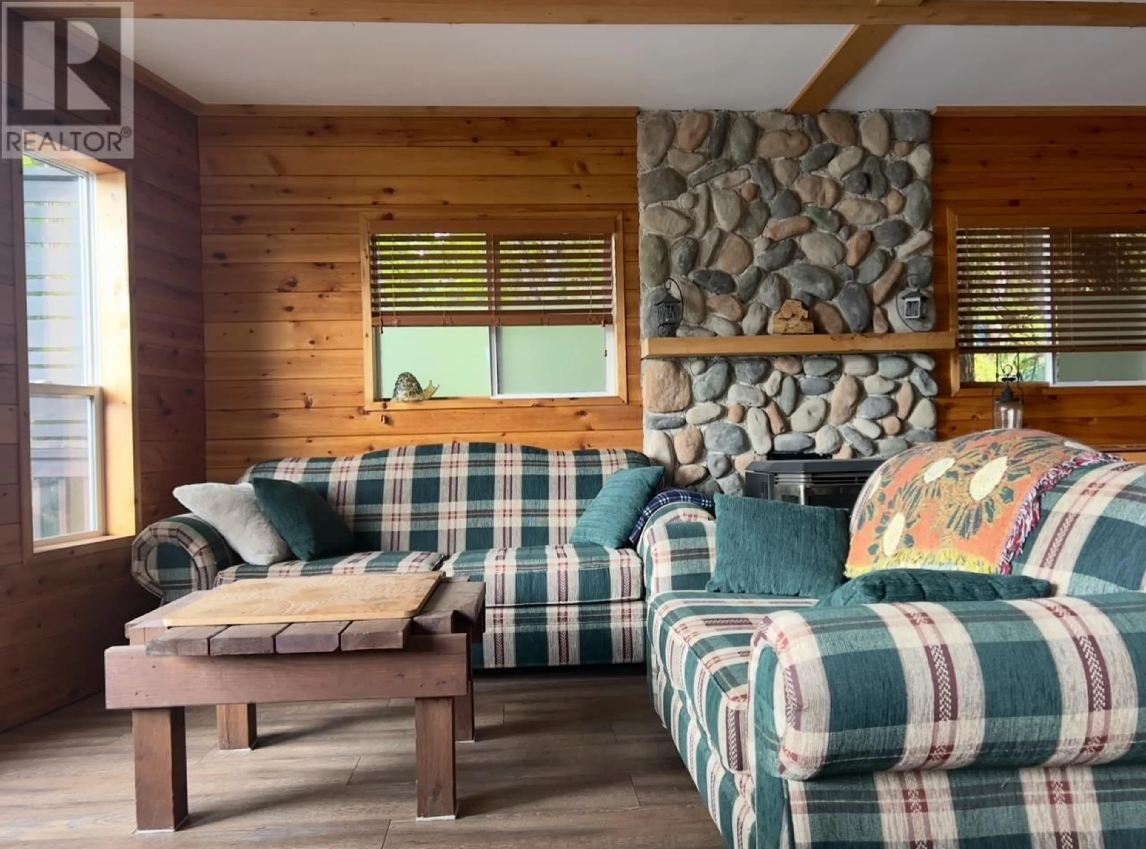 Living room with furniture, wood/laminate floor for 2862 SQUIRREL POINT ROAD, Terrace British Columbia V8G1R1
