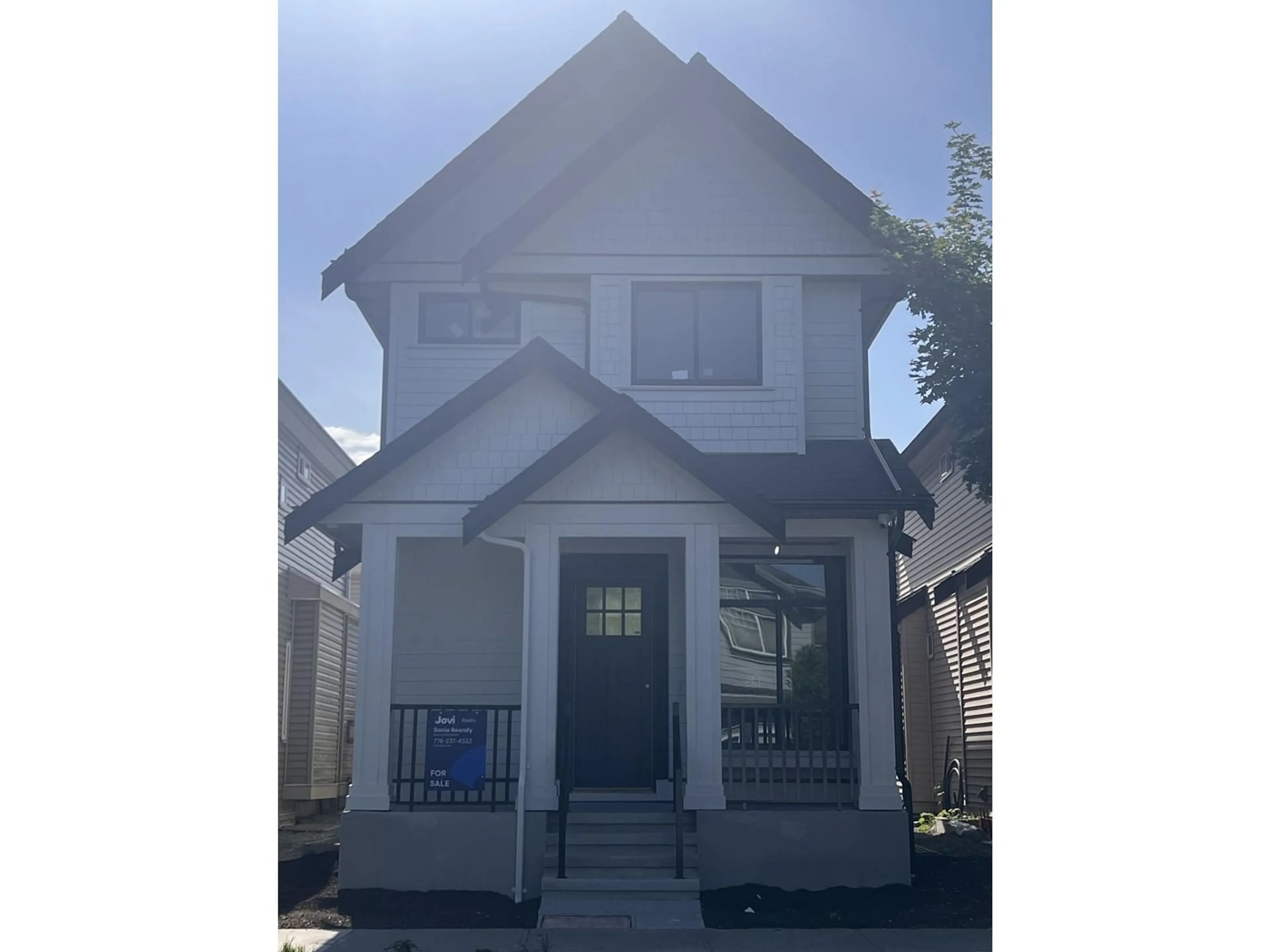 Home with vinyl exterior material, street for 7265 192A, Surrey British Columbia V4N5Y3