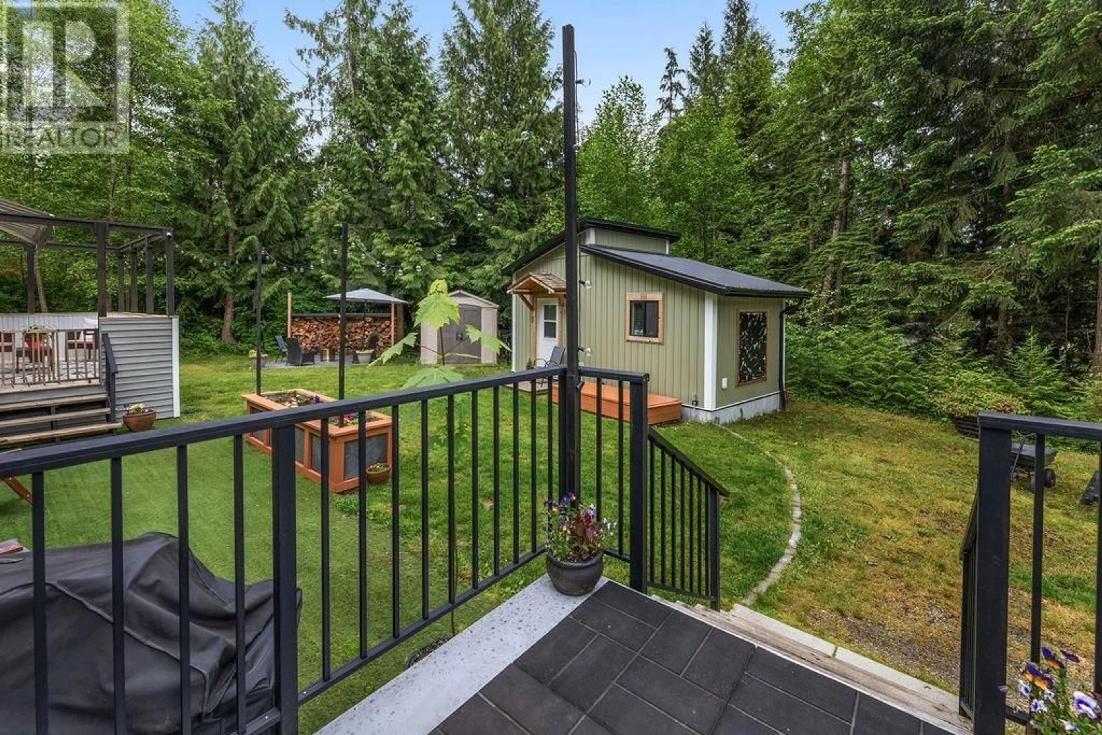 Patio, forest/trees view for 5954 LEANING TREE ROAD, Halfmoon Bay British Columbia V7Z1C2
