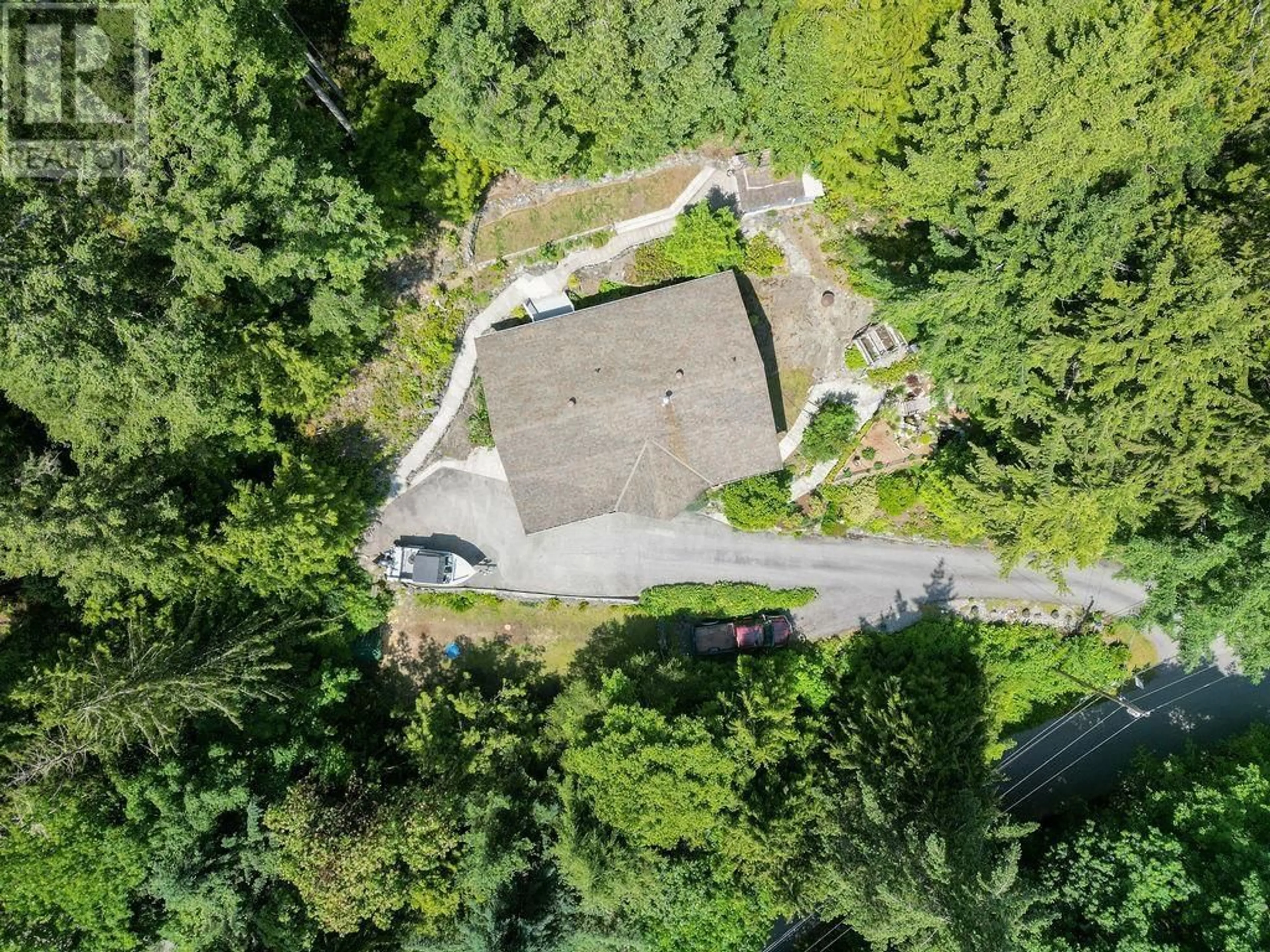 A pic from outside/outdoor area/front of a property/back of a property/a pic from drone, forest/trees view for 5549 SANS SOUCI ROAD, Halfmoon Bay British Columbia V7Z1B6