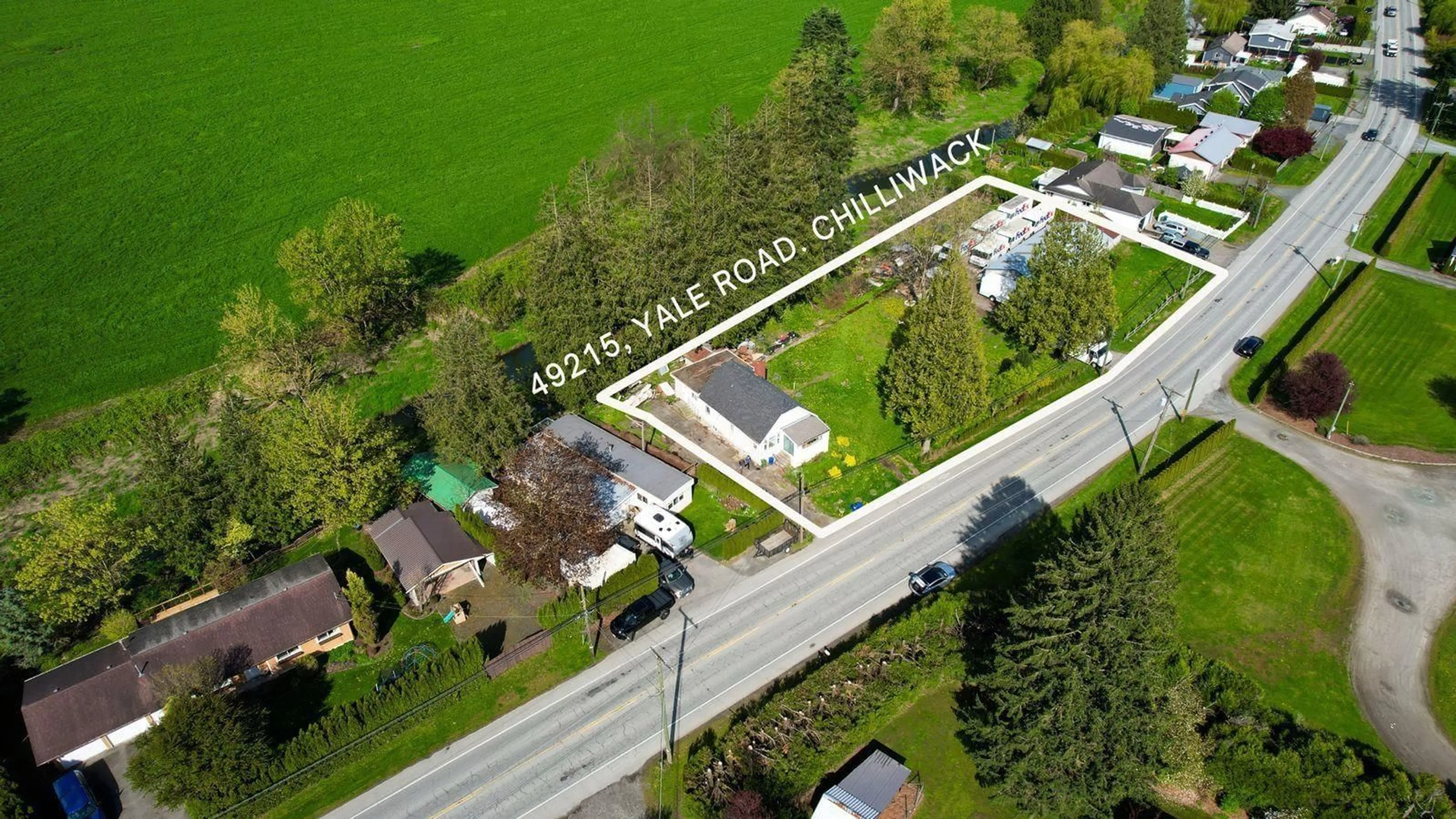 A pic from outside/outdoor area/front of a property/back of a property/a pic from drone, street for 49215 YALE ROAD, Chilliwack British Columbia V4Z0B2