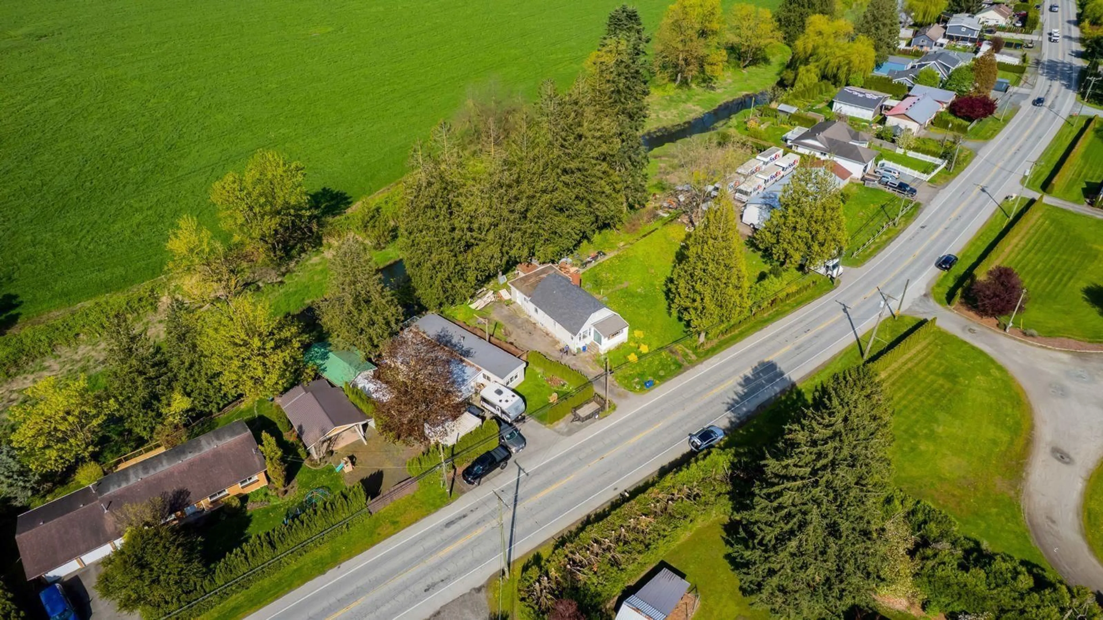 A pic from outside/outdoor area/front of a property/back of a property/a pic from drone, street for 49215 YALE ROAD, Chilliwack British Columbia V4Z0B2