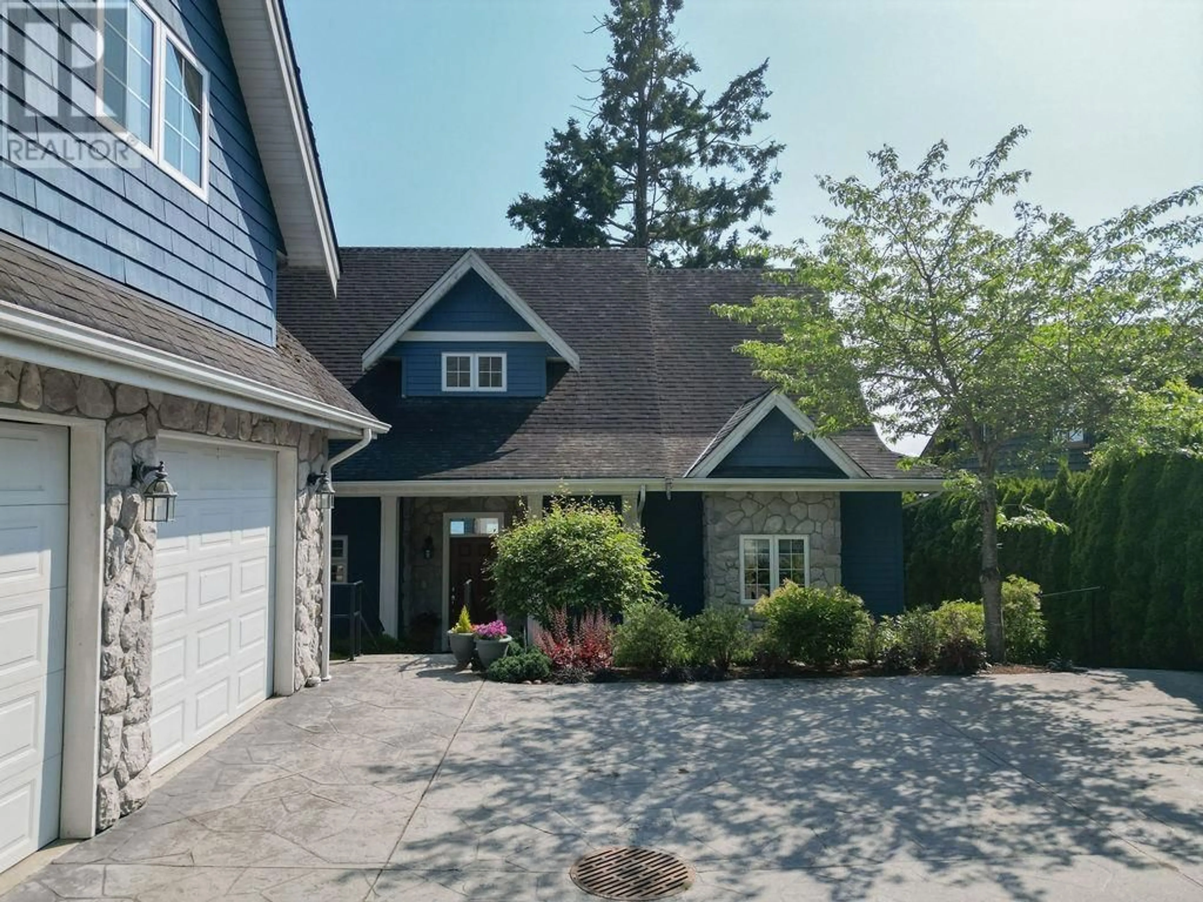 Home with vinyl exterior material, street for 2729 LOWER ROAD, Roberts Creek British Columbia V0N2W4
