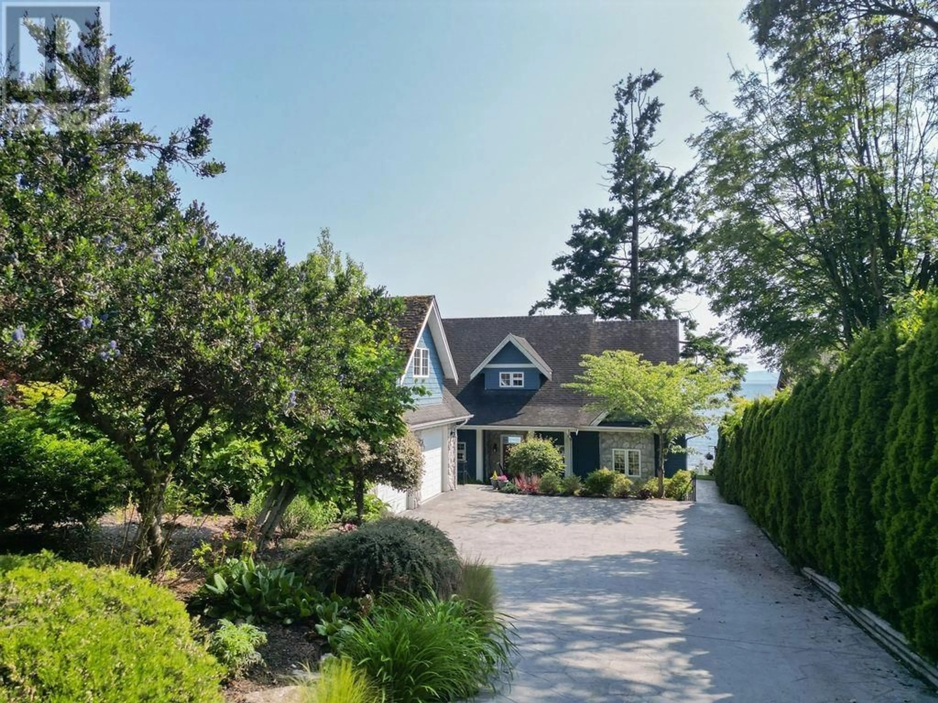 A pic from outside/outdoor area/front of a property/back of a property/a pic from drone, street for 2729 LOWER ROAD, Roberts Creek British Columbia V0N2W4