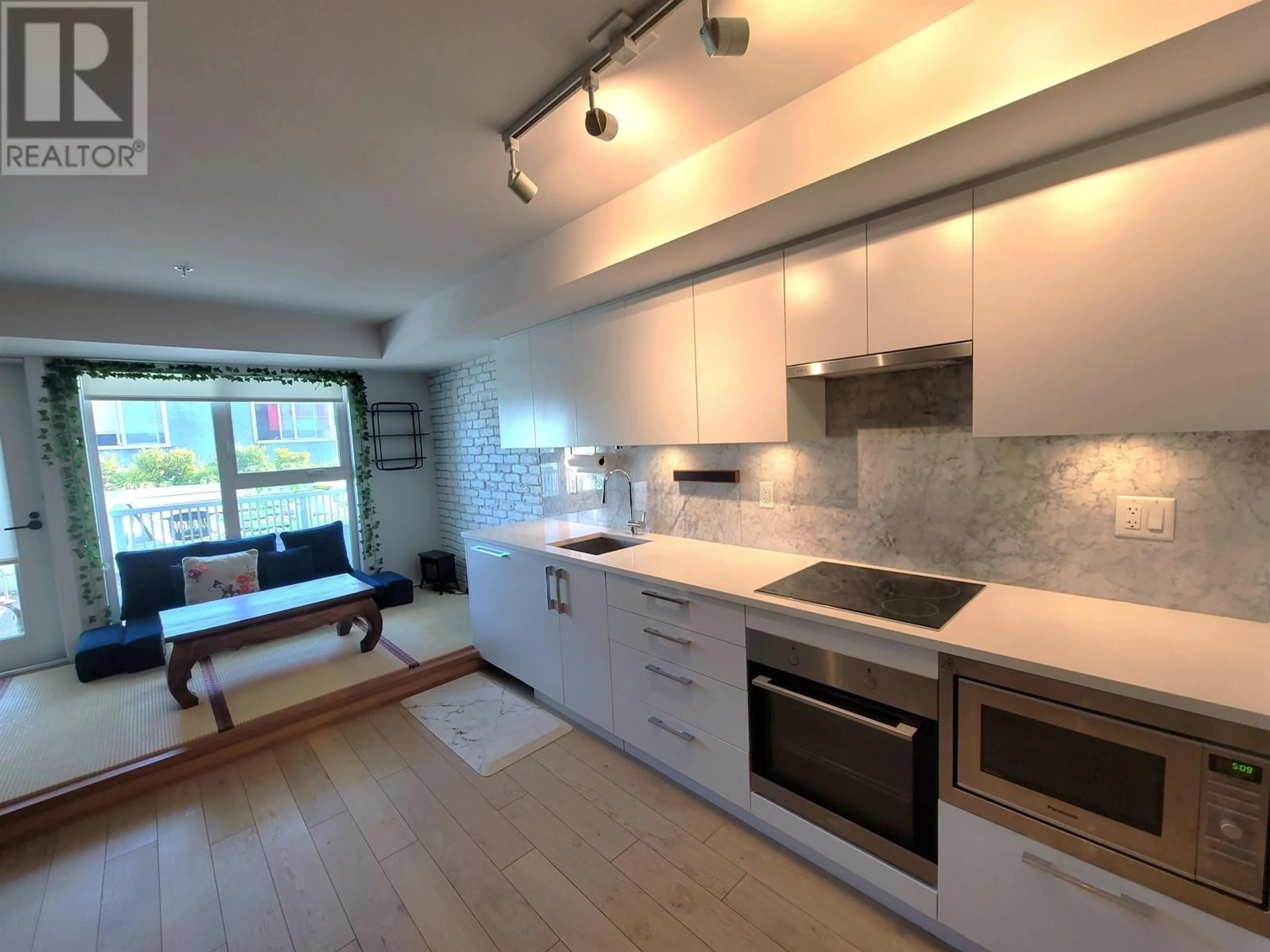 Unknown for 211 - 2508 FRASER STREET, Vancouver British Columbia V5T1T1
