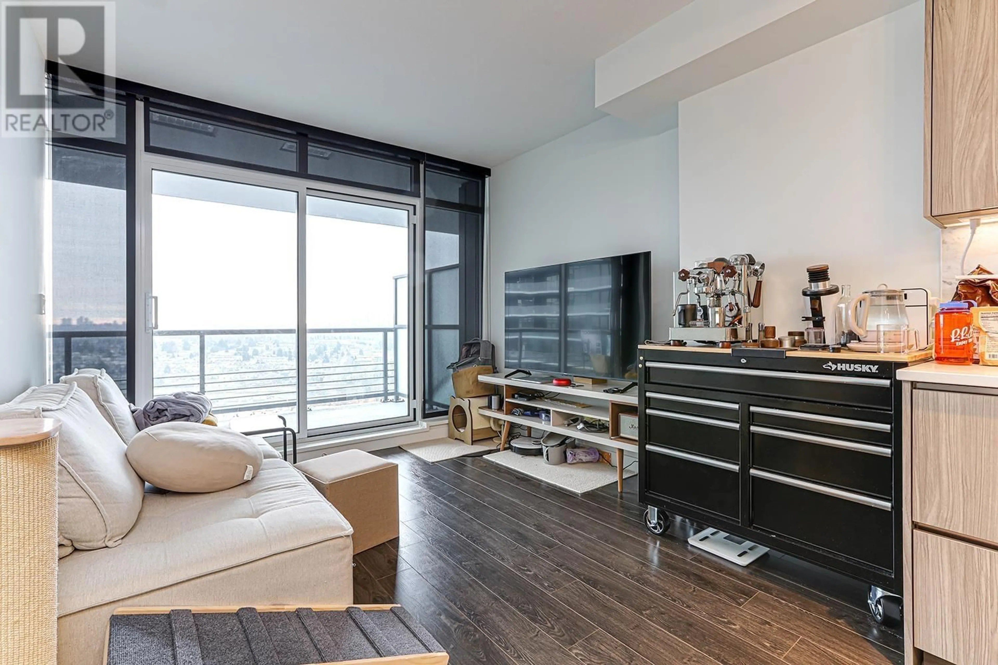 Living room with furniture, wood/laminate floor for 2912 - 4730 LOUGHEED HIGHWAY, Burnaby British Columbia V5C0M9