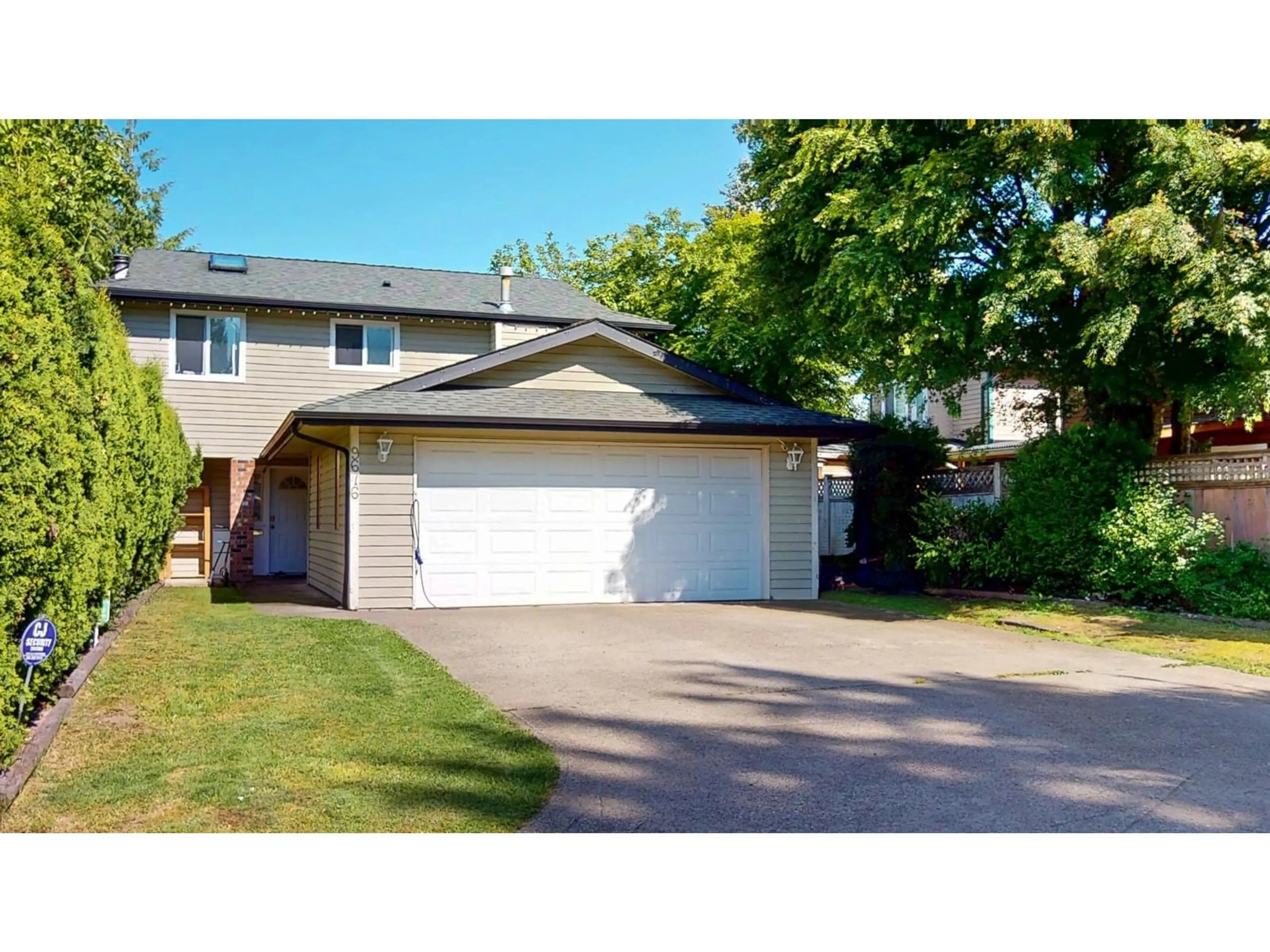 Home with vinyl exterior material, street for 9676 155B, Surrey British Columbia V3R7N9