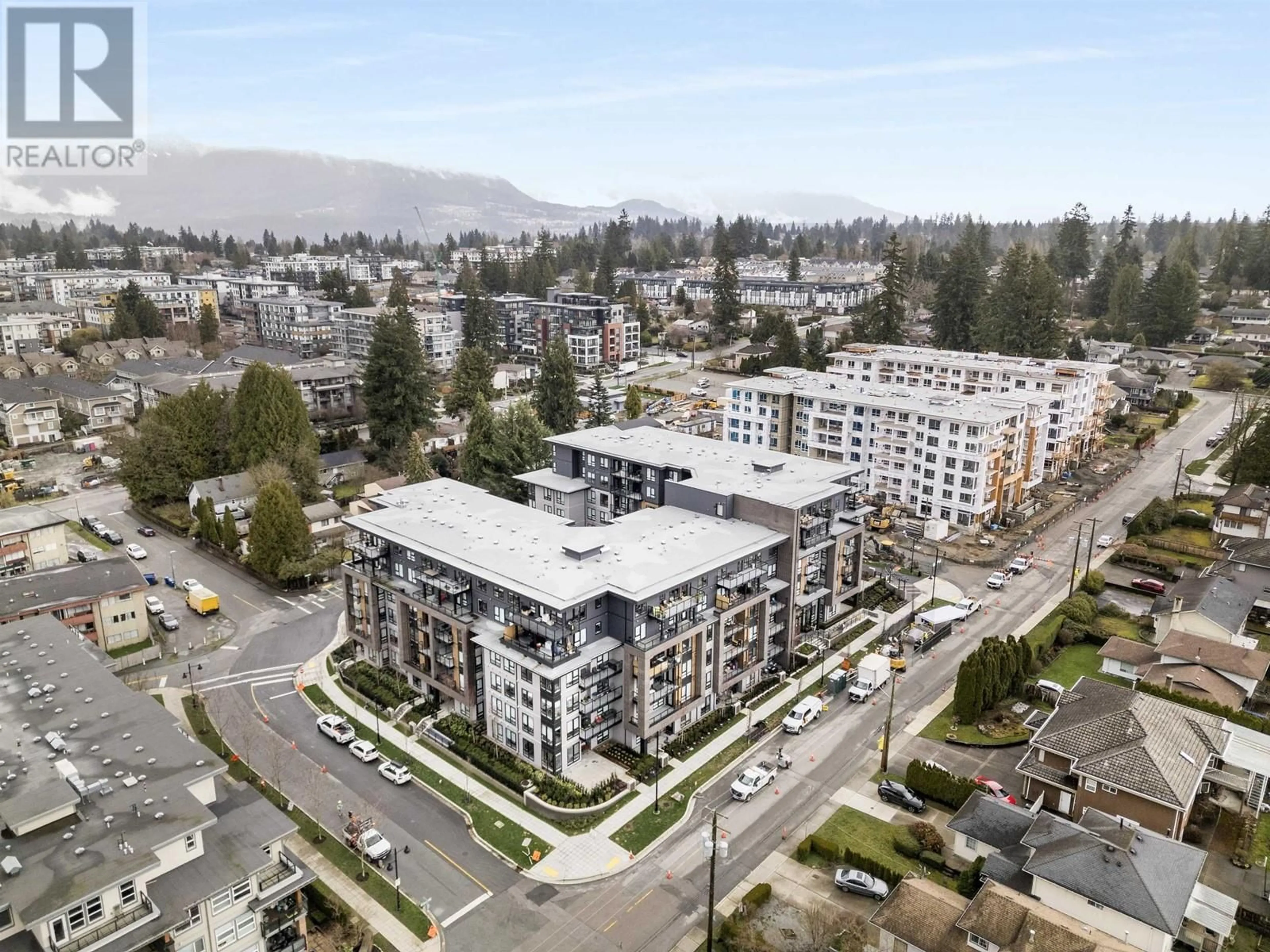 A pic from outside/outdoor area/front of a property/back of a property/a pic from drone, mountain view for 521 - 615 COTTONWOOD AVENUE, Coquitlam British Columbia V3J2S5