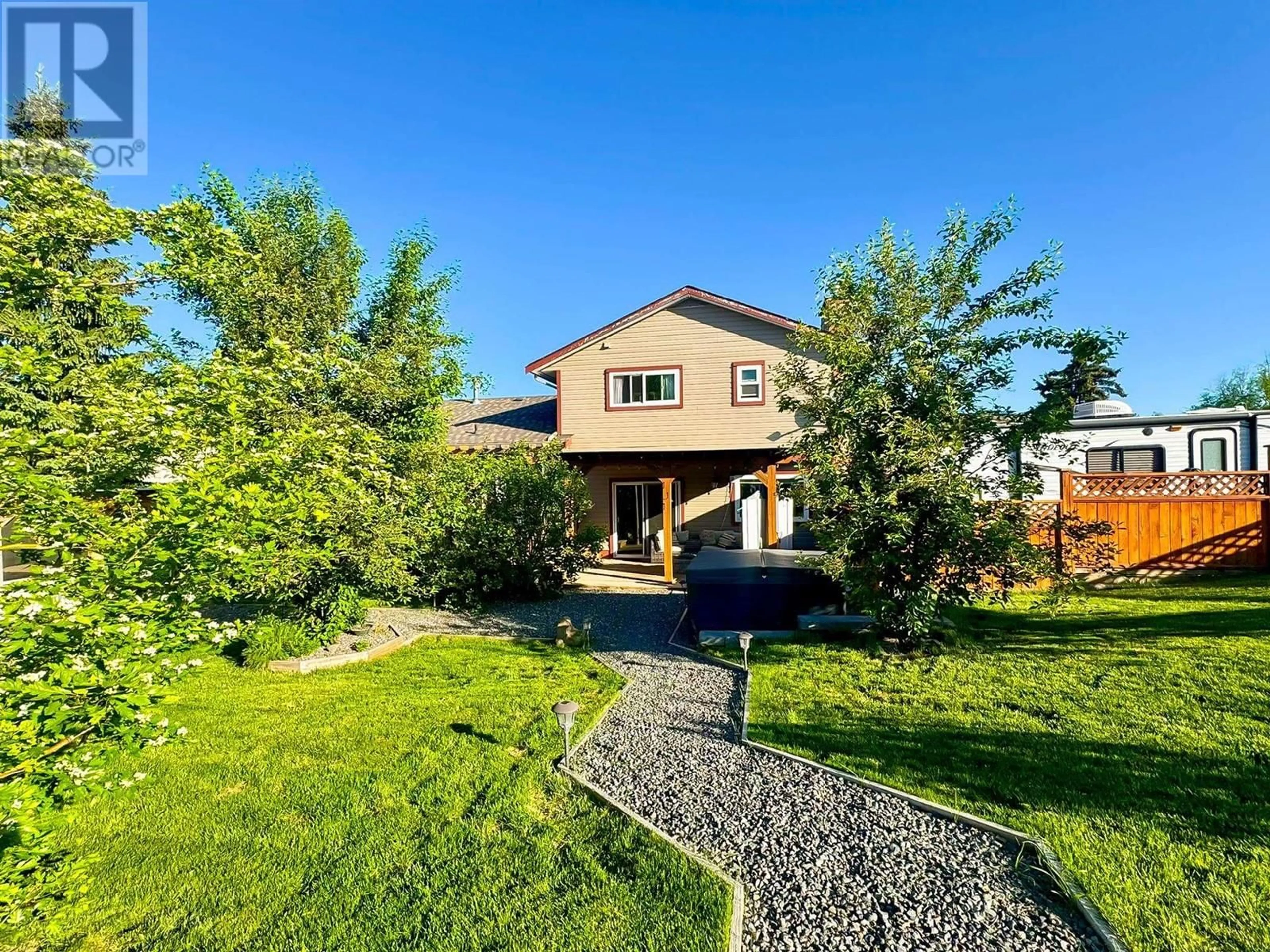 A pic from outside/outdoor area/front of a property/back of a property/a pic from drone, street for 253 BIRCH AVENUE, 100 Mile House British Columbia V0K2E0