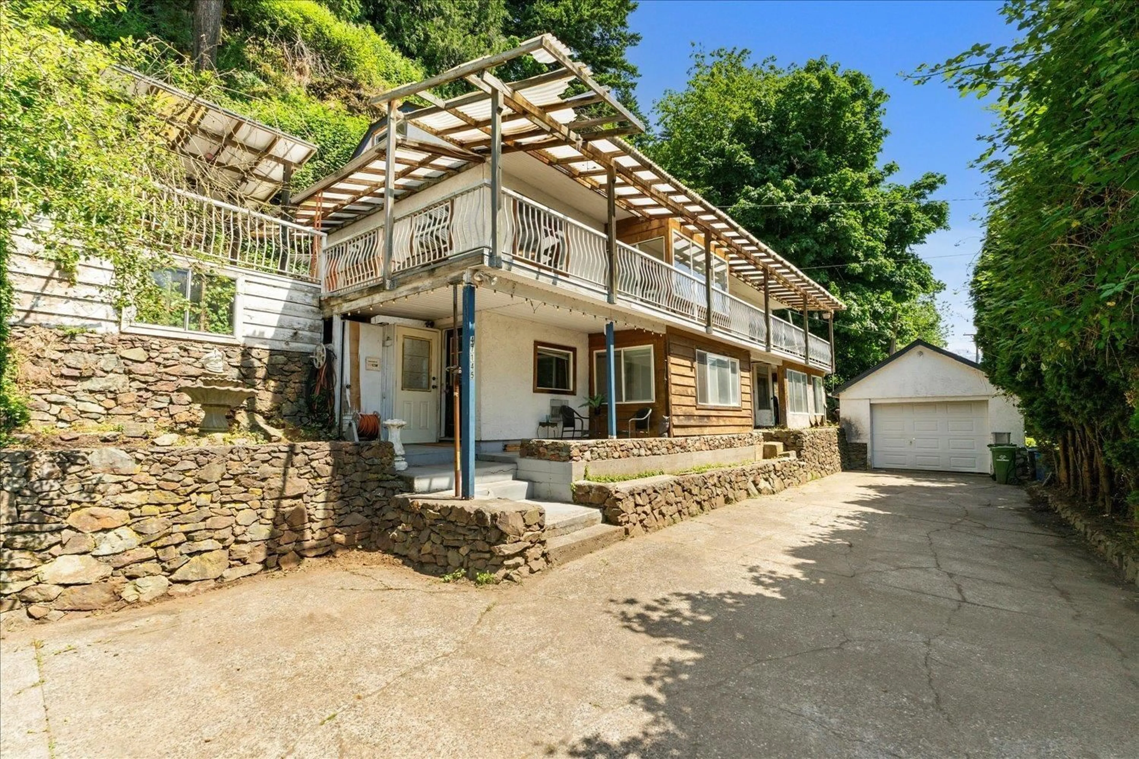 A pic from outside/outdoor area/front of a property/back of a property/a pic from drone, unknown for 47145 YALE ROAD, Chilliwack British Columbia V2P7M9