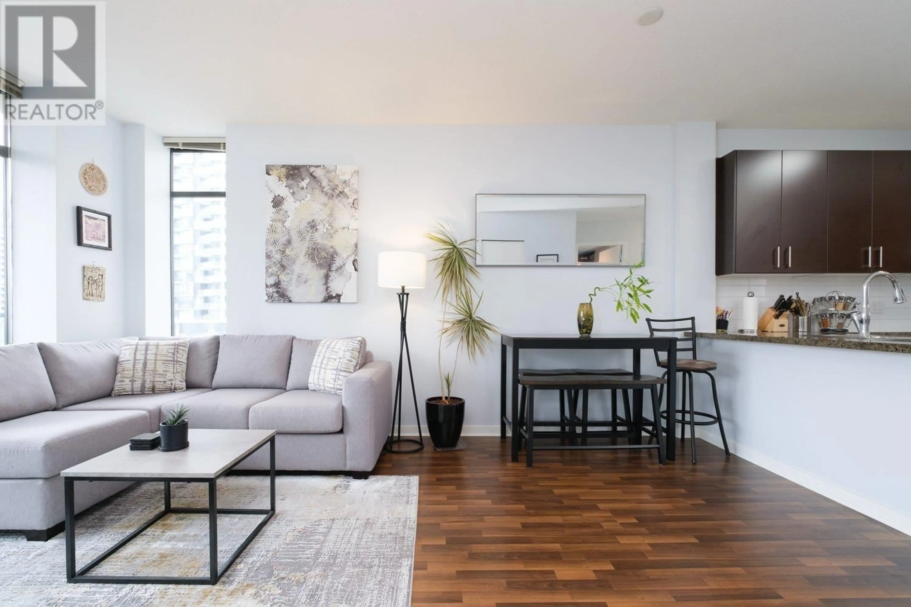Living room with furniture, wood/laminate floor for 702 - 4250 DAWSON STREET, Burnaby British Columbia V5C4B1