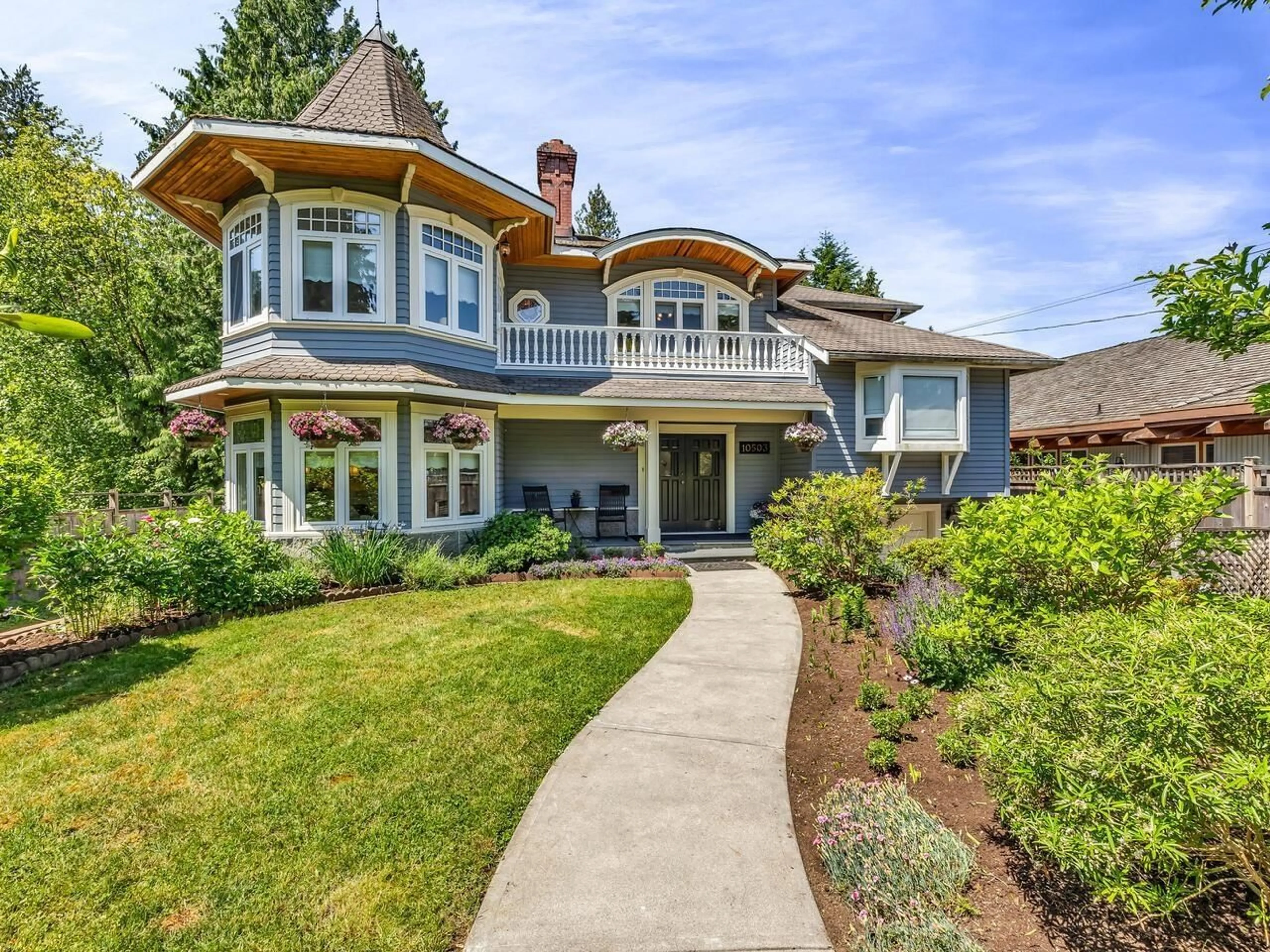 Home with vinyl exterior material, street for 10503 127, Surrey British Columbia V3V5K3