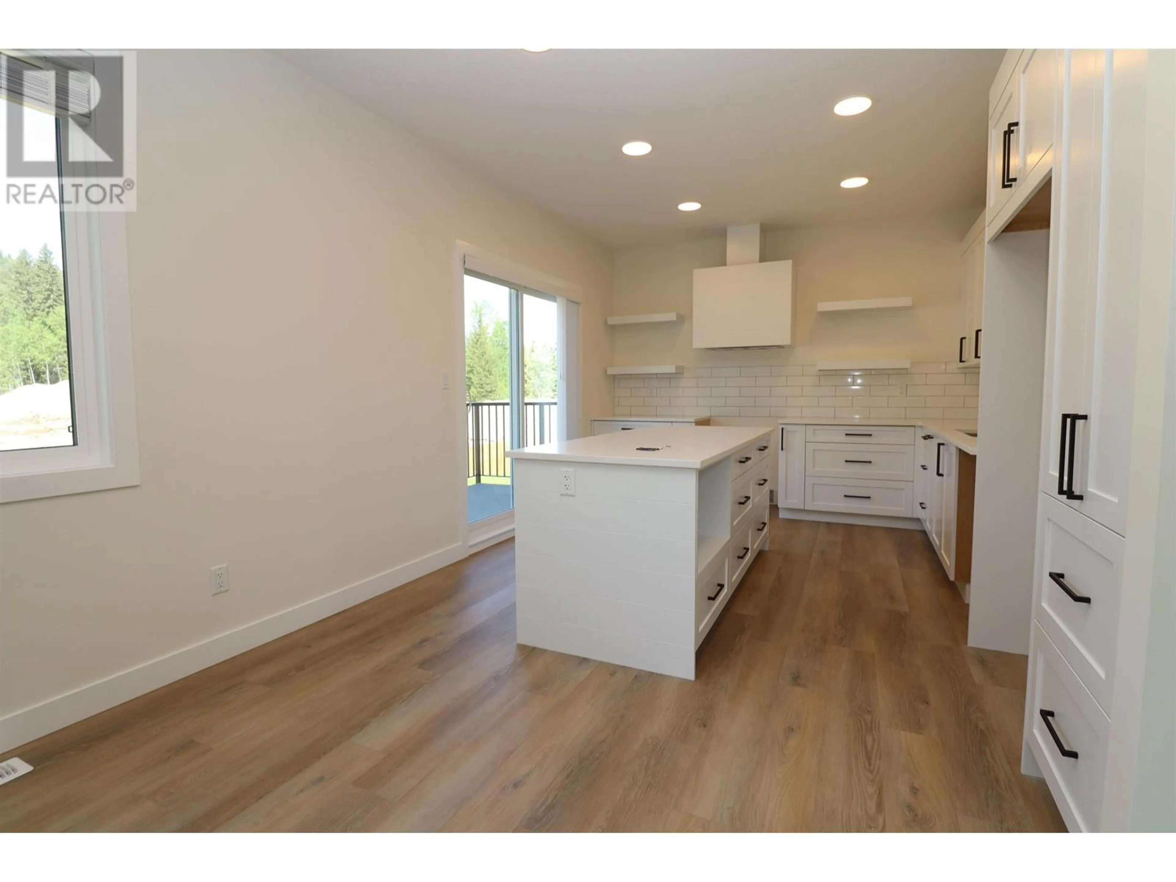 Open concept kitchen, wood/laminate floor for 801 - 4274 22ND AVENUE, Prince George British Columbia V2N0J4