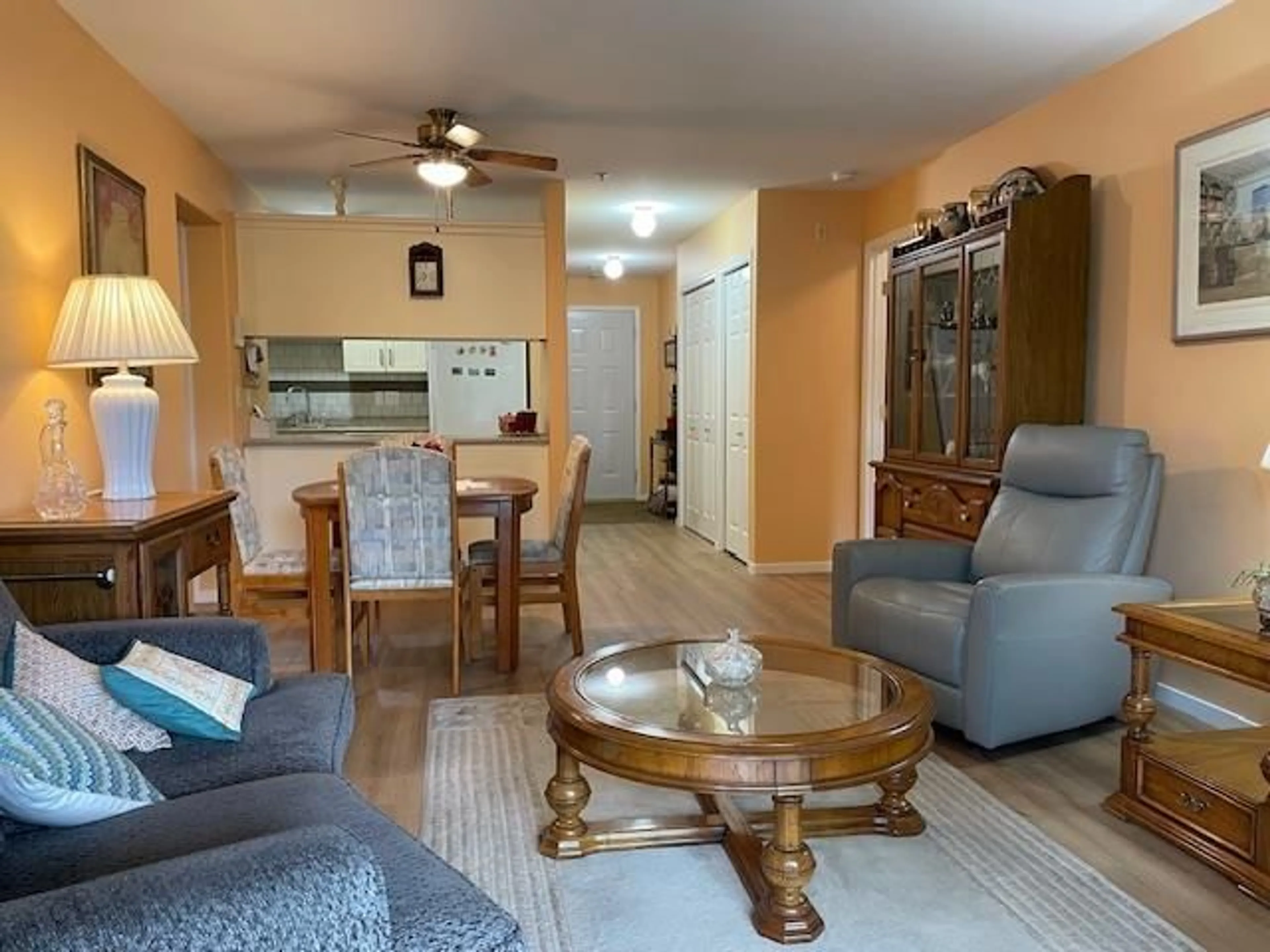 Living room with furniture, wood/laminate floor for 204 - 8980 MARY STREET, Chilliwack British Columbia V2P4J3