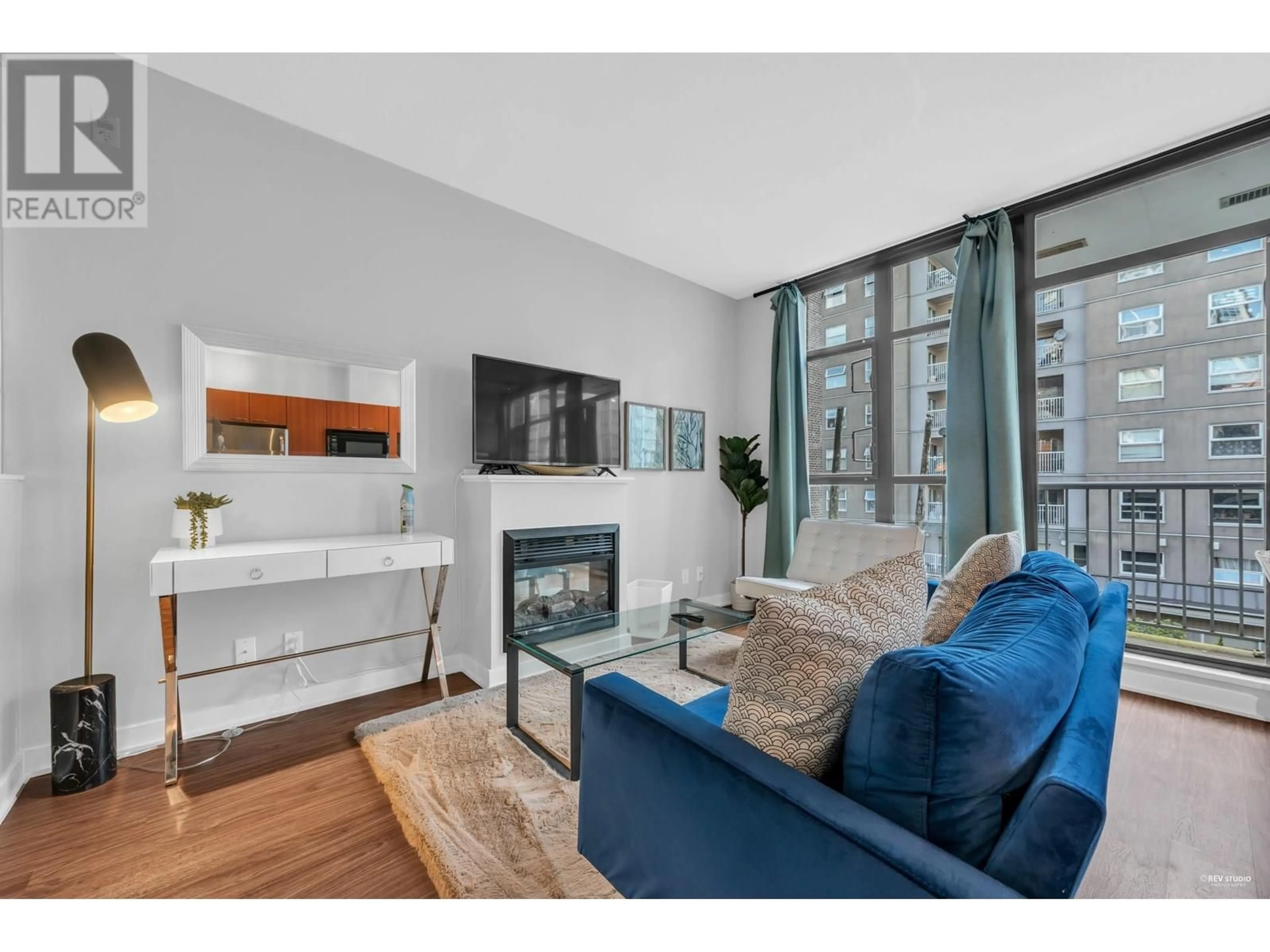 Living room with furniture, wood/laminate floor for 406 - 1249 GRANVILLE STREET, Vancouver British Columbia V6Z1M5