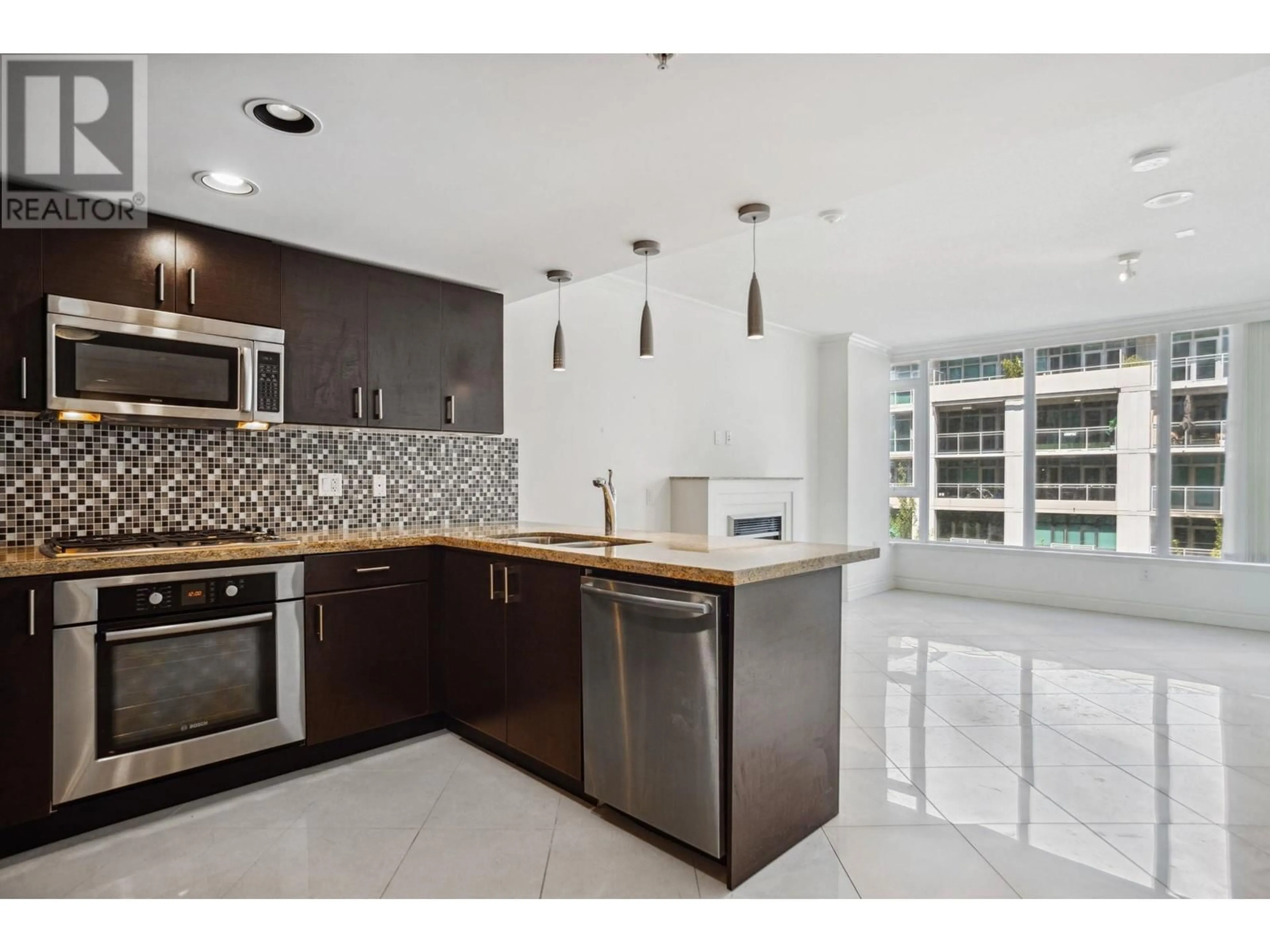 Open concept kitchen, ceramic/tile floor for 408 - 133 ESPLANADE AVENUE, North Vancouver British Columbia V7L1A1