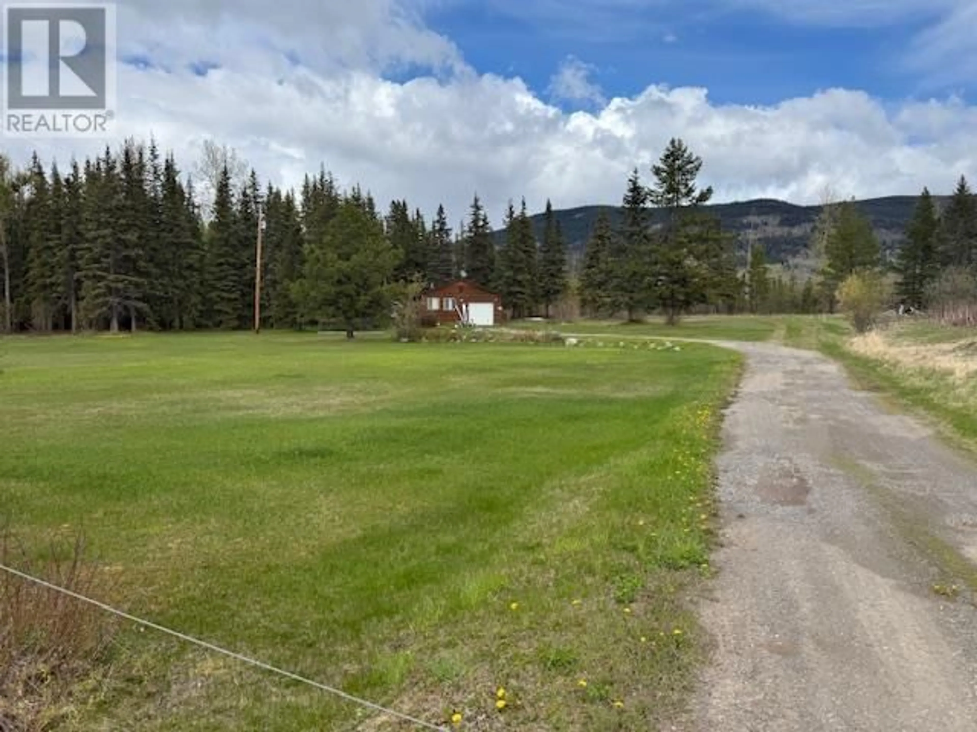 A pic from outside/outdoor area/front of a property/back of a property/a pic from drone, mountain view for 41742 16 HIGHWAY, Houston British Columbia V0J1Z1