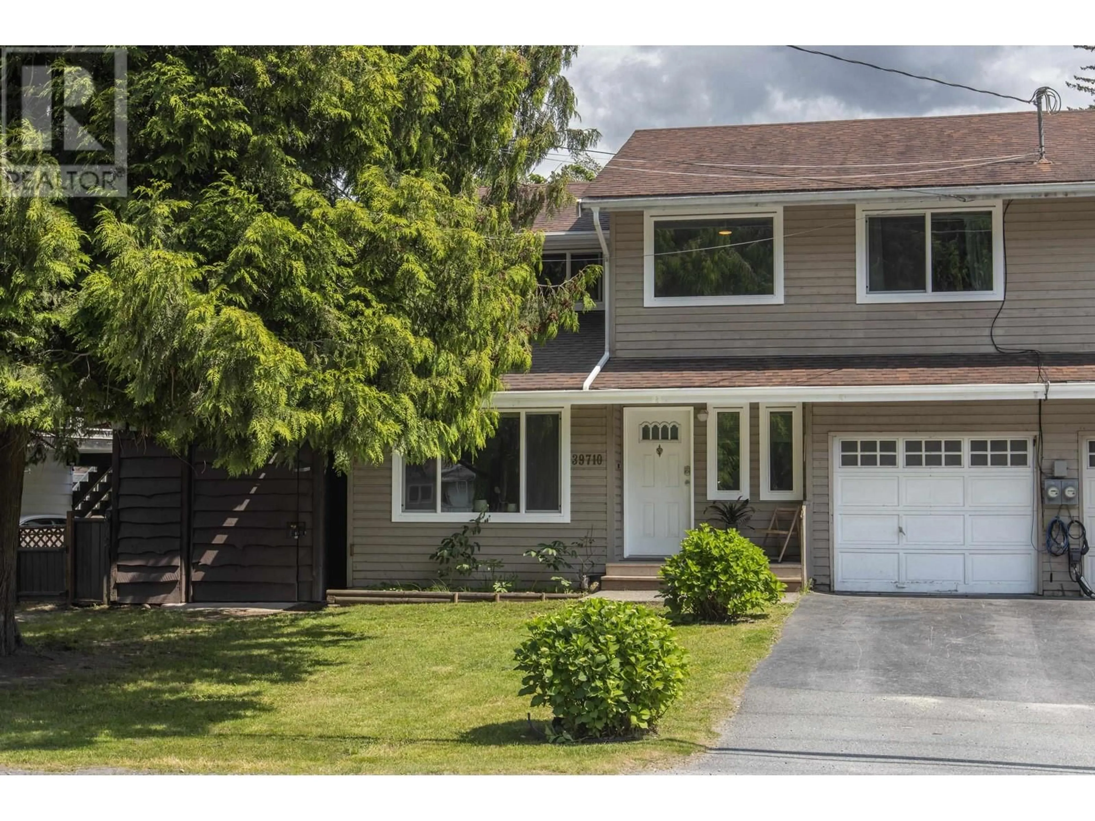 Home with vinyl exterior material, street for 39710 GOVERNMENT ROAD, Squamish British Columbia V8B0A5