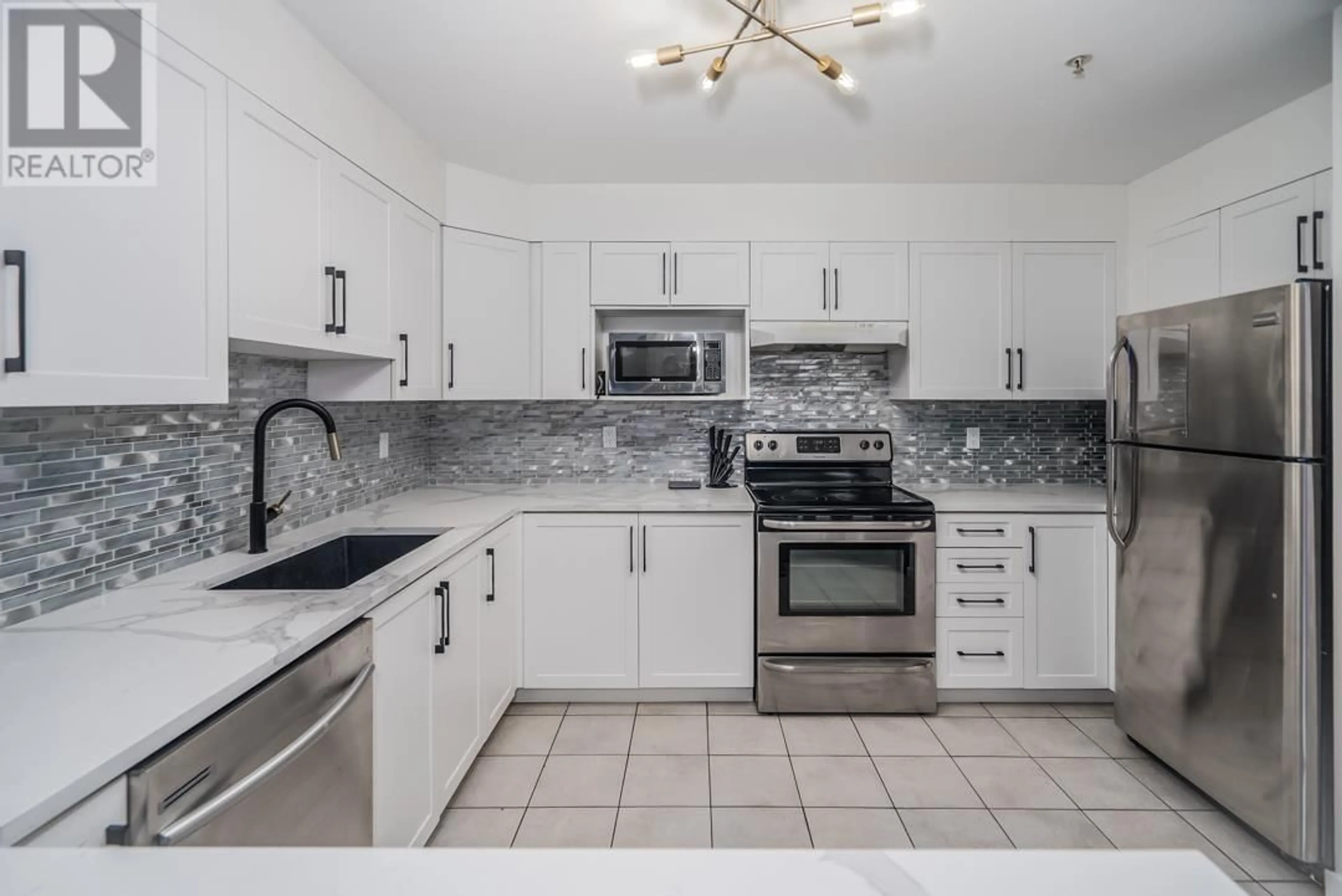 Standard kitchen, ceramic/tile floor for 311 - 121 SHORELINE CIRCLE, Port Moody British Columbia V3H5G2