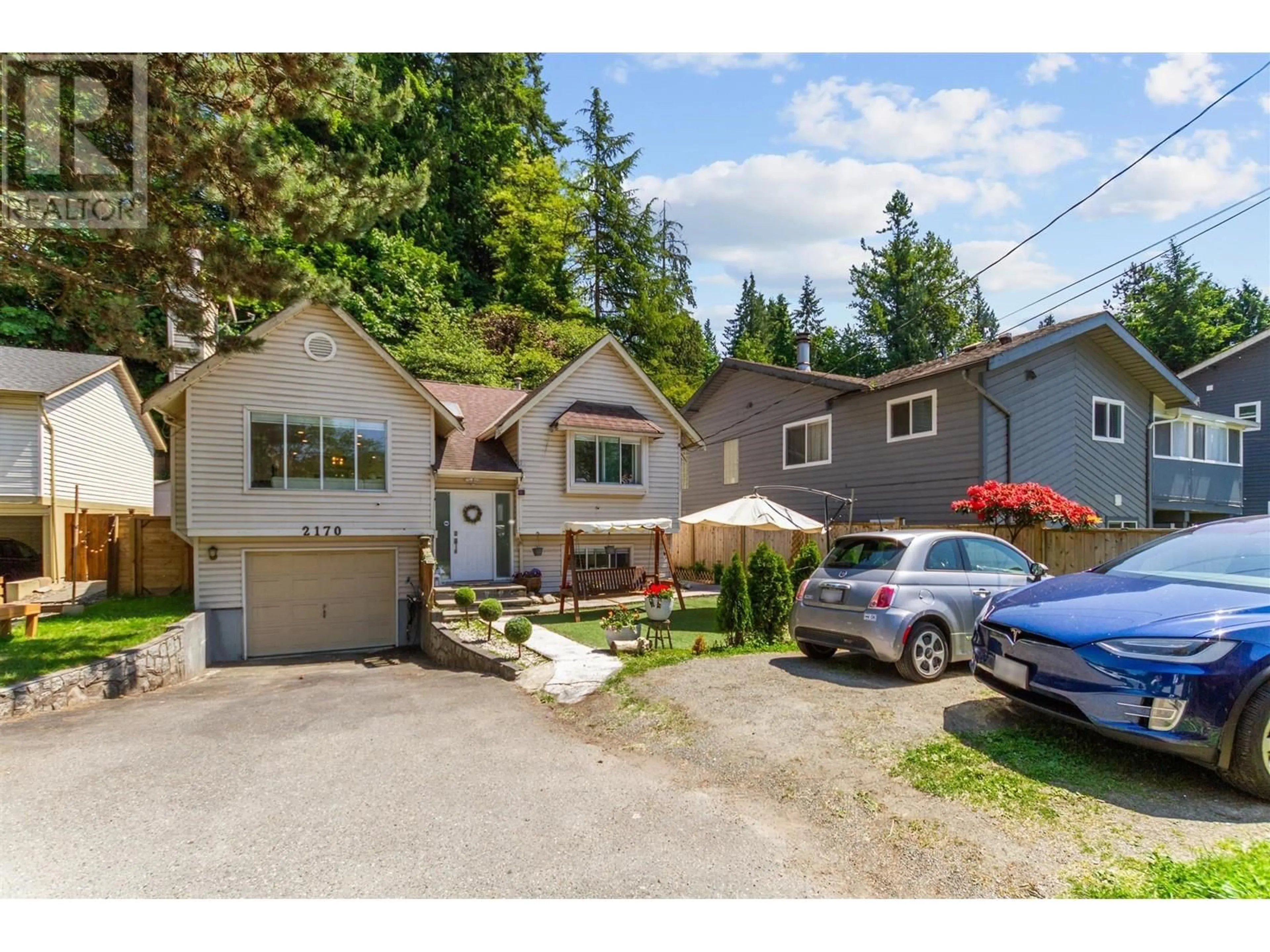 A pic from outside/outdoor area/front of a property/back of a property/a pic from drone, street for 2170 CAPILANO ROAD, North Vancouver British Columbia V7P3B9