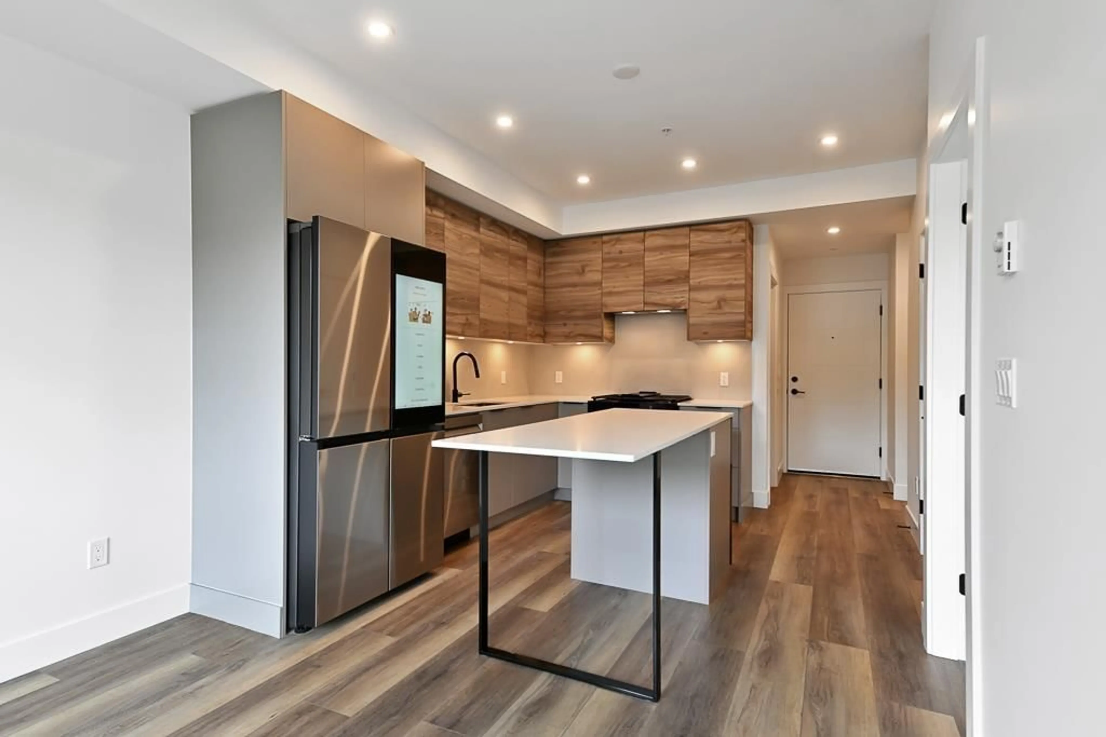 Open concept kitchen, wood/laminate floor for 108 - 30490 CARDINAL, Abbotsford British Columbia V2T0C5