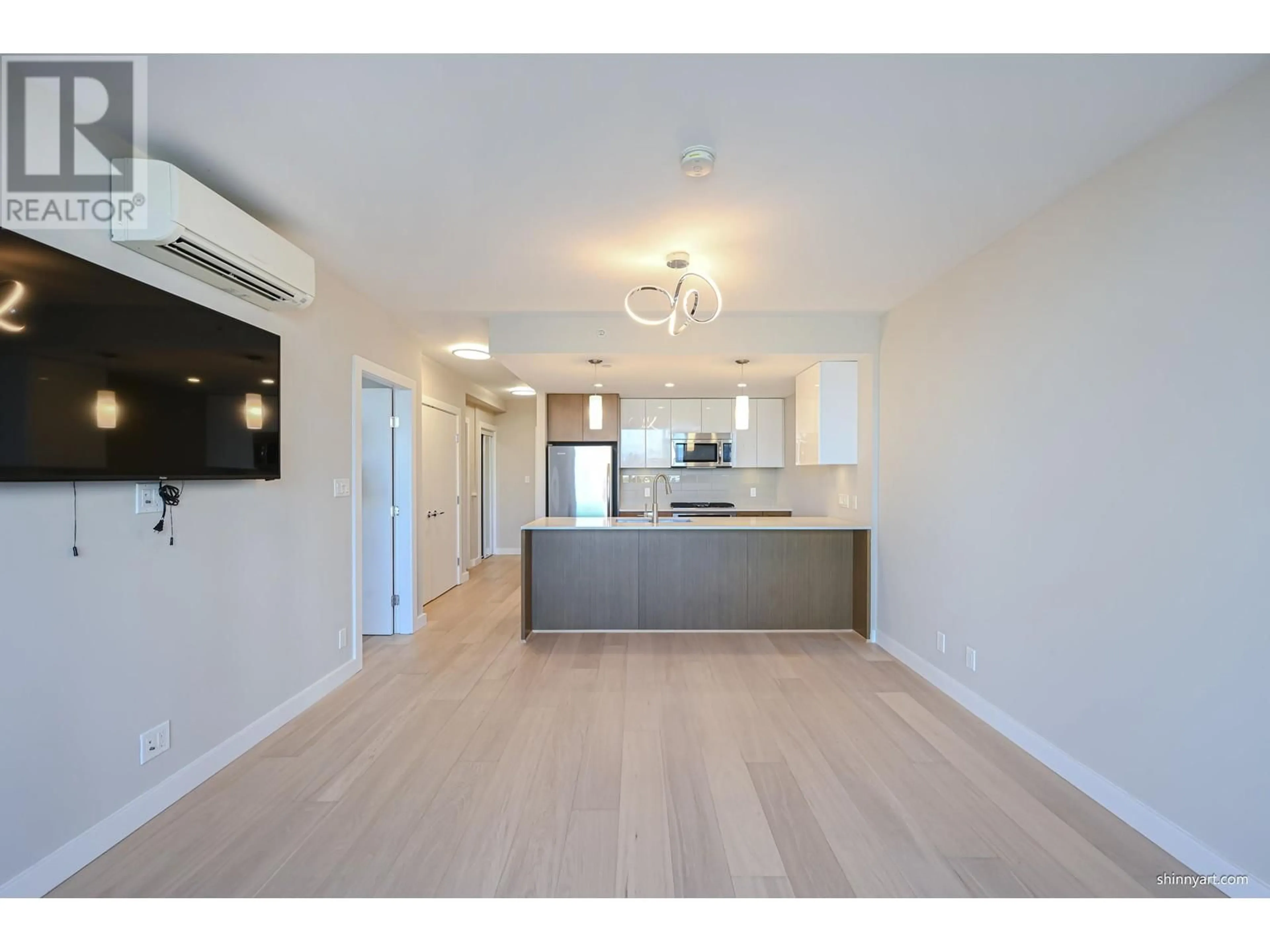 Open concept kitchen, wood/laminate floor for 6016 - 5511 HOLLYBRIDGE WAY, Richmond British Columbia V7C0A3
