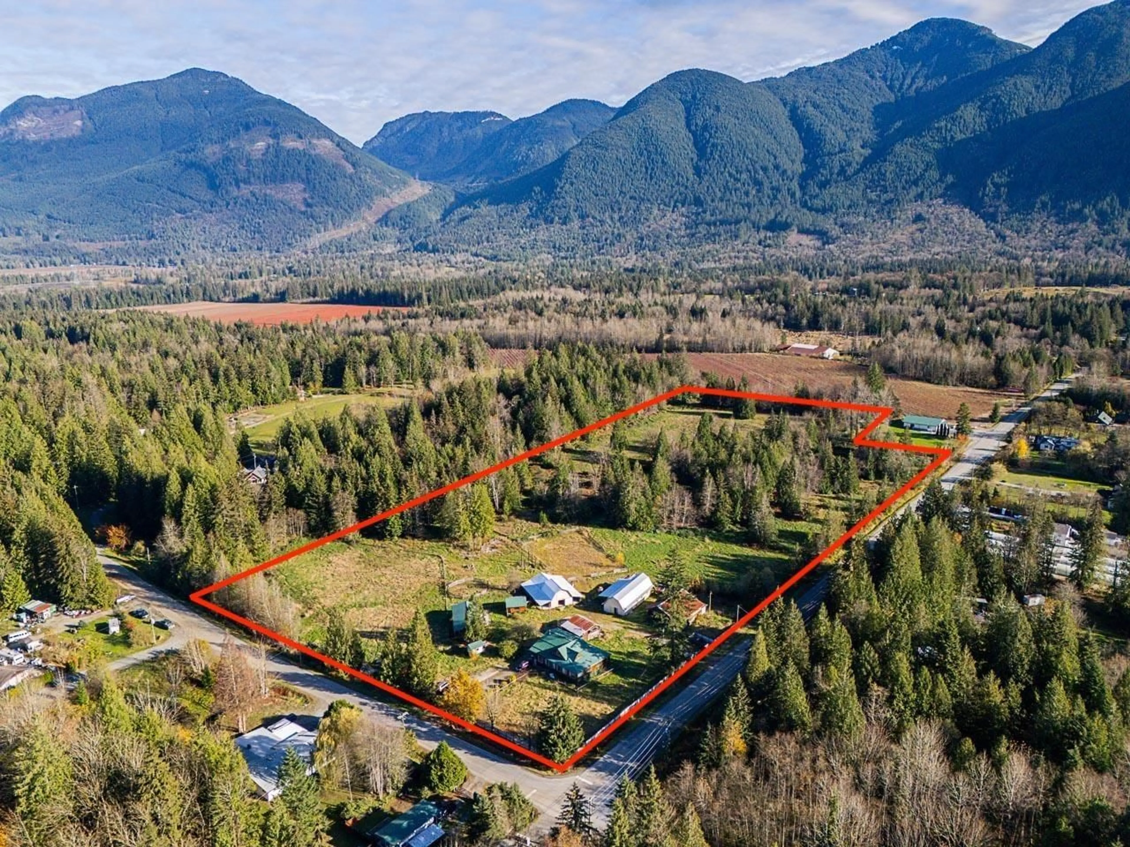 A pic from outside/outdoor area/front of a property/back of a property/a pic from drone, mountain view for 13620 STAVE LAKE, Mission British Columbia V2V0A5