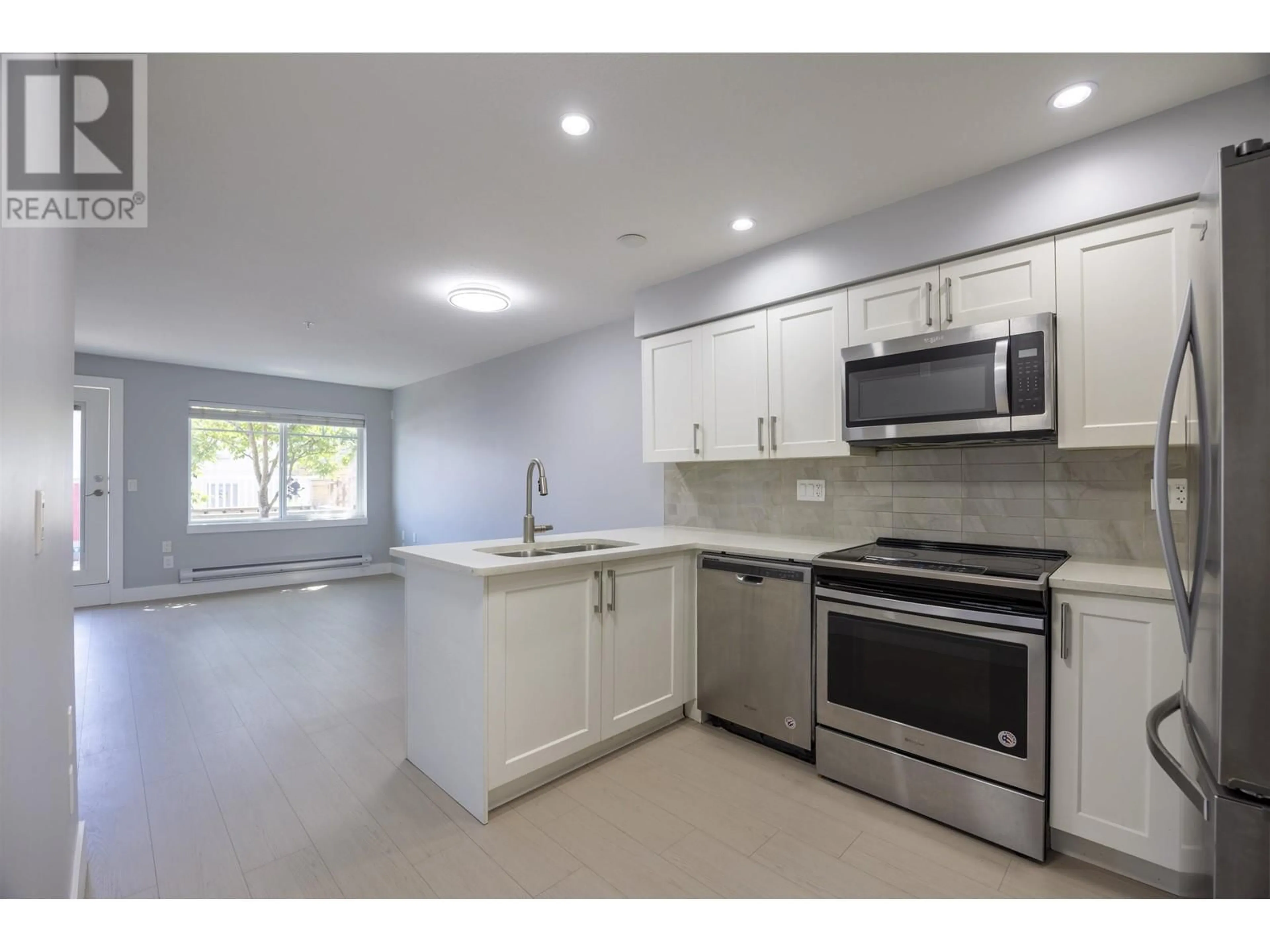 Open concept kitchen, unknown for 105 - 1990 WESTMINSTER AVENUE, Port Coquitlam British Columbia V3B1E8