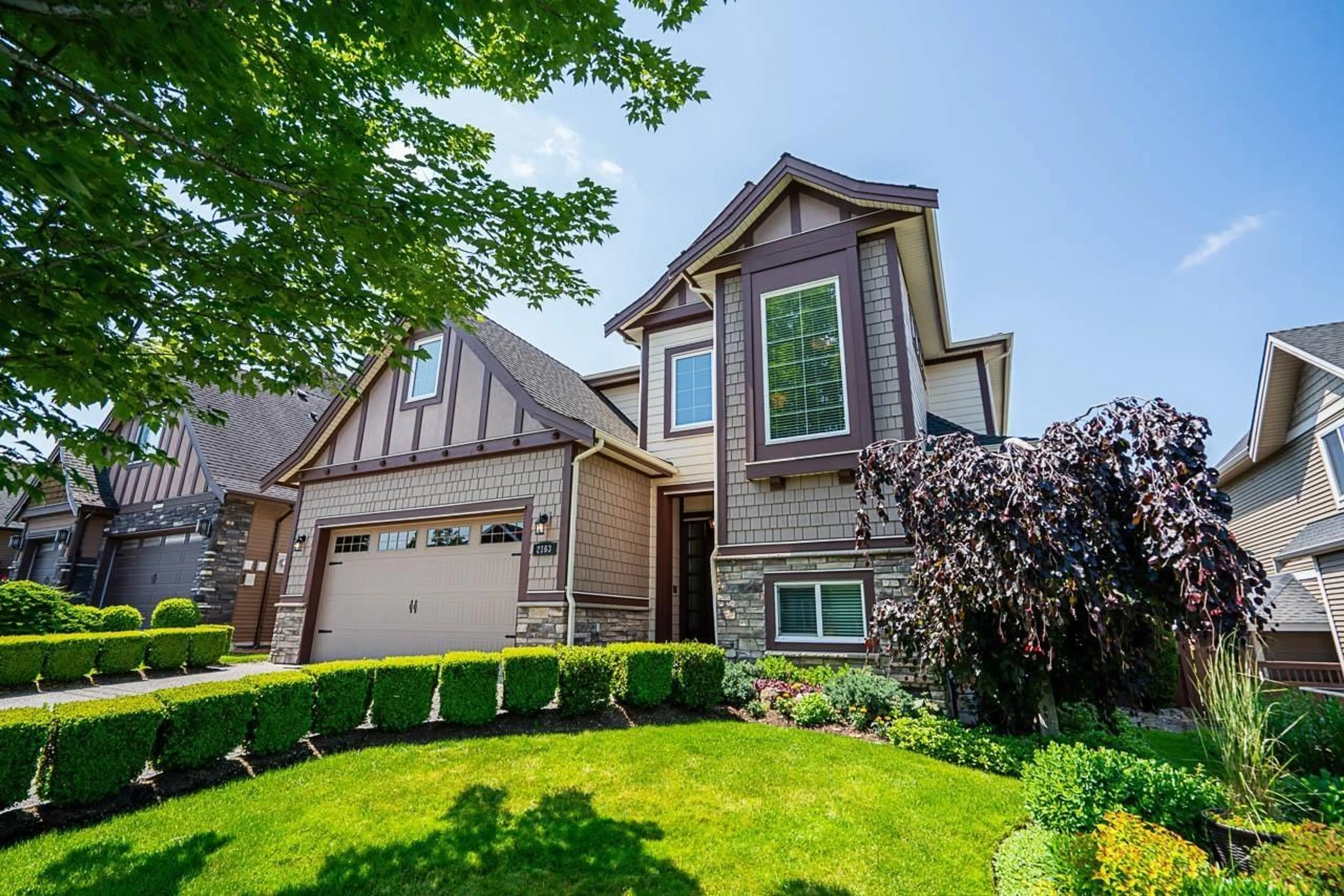 Home with vinyl exterior material, street for 2163 RIESLING, Abbotsford British Columbia V4X0A6