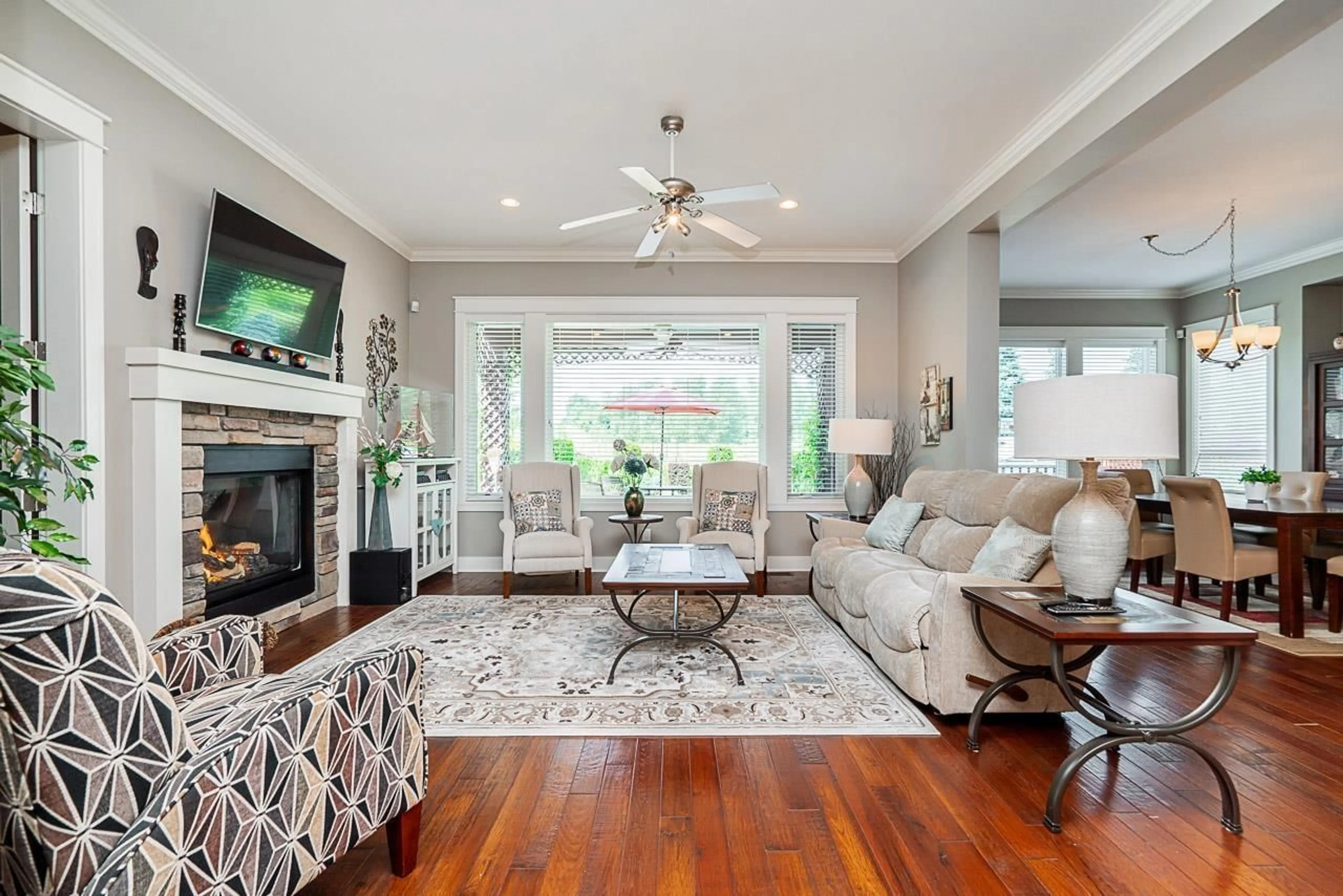 Living room with furniture, wood/laminate floor for 2163 RIESLING, Abbotsford British Columbia V4X0A6